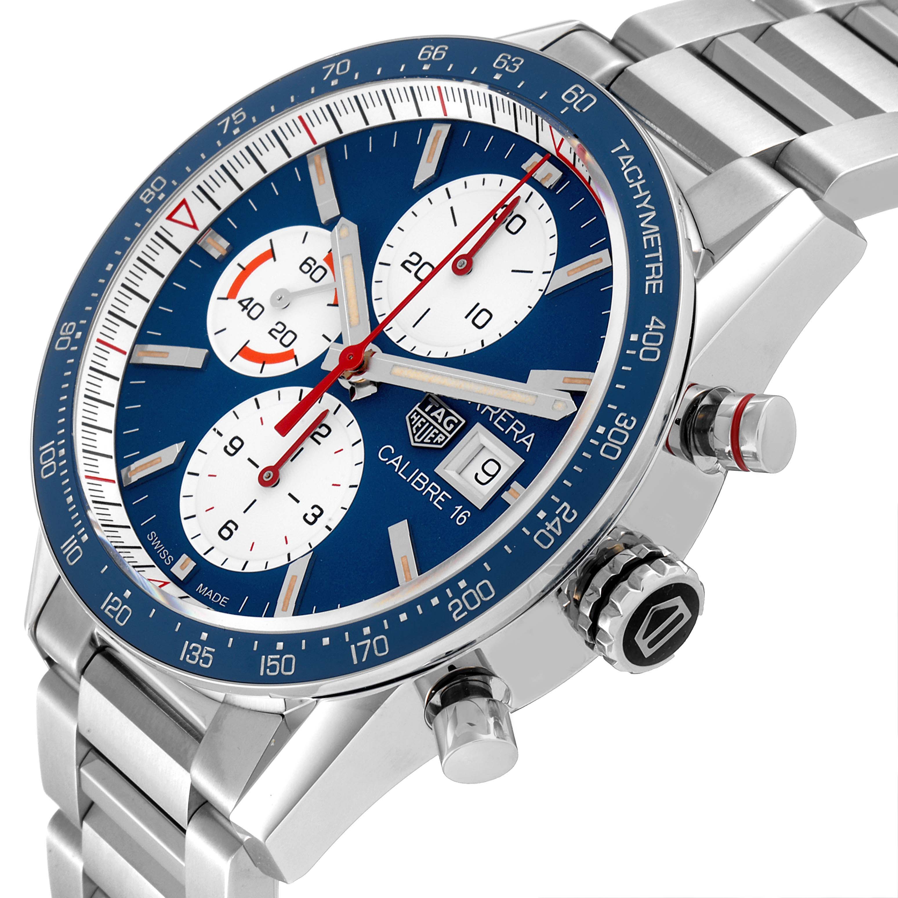 The Tag Heuer Carrera CV201AR.BA0715 Men's Stainless Steel Blue Dial CV201AR.BA0715 Men's Stainless Steel Blue Dial model watch is shown at a slight angle highlighting its dial, tachymeter bezel, and stainless steel bracelet.