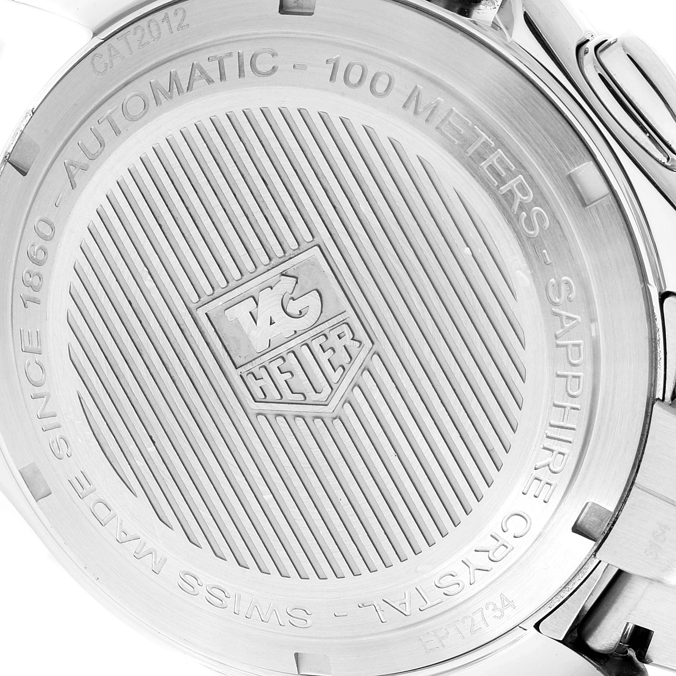 The image shows the back case of a Tag Heuer Link CAT2012.BA0952 Men
s Stainless Steel Black Dial CAT2012.BA0952 Men
s Stainless Steel Black Dial model watch, highlighting the engraved branding and specifications.