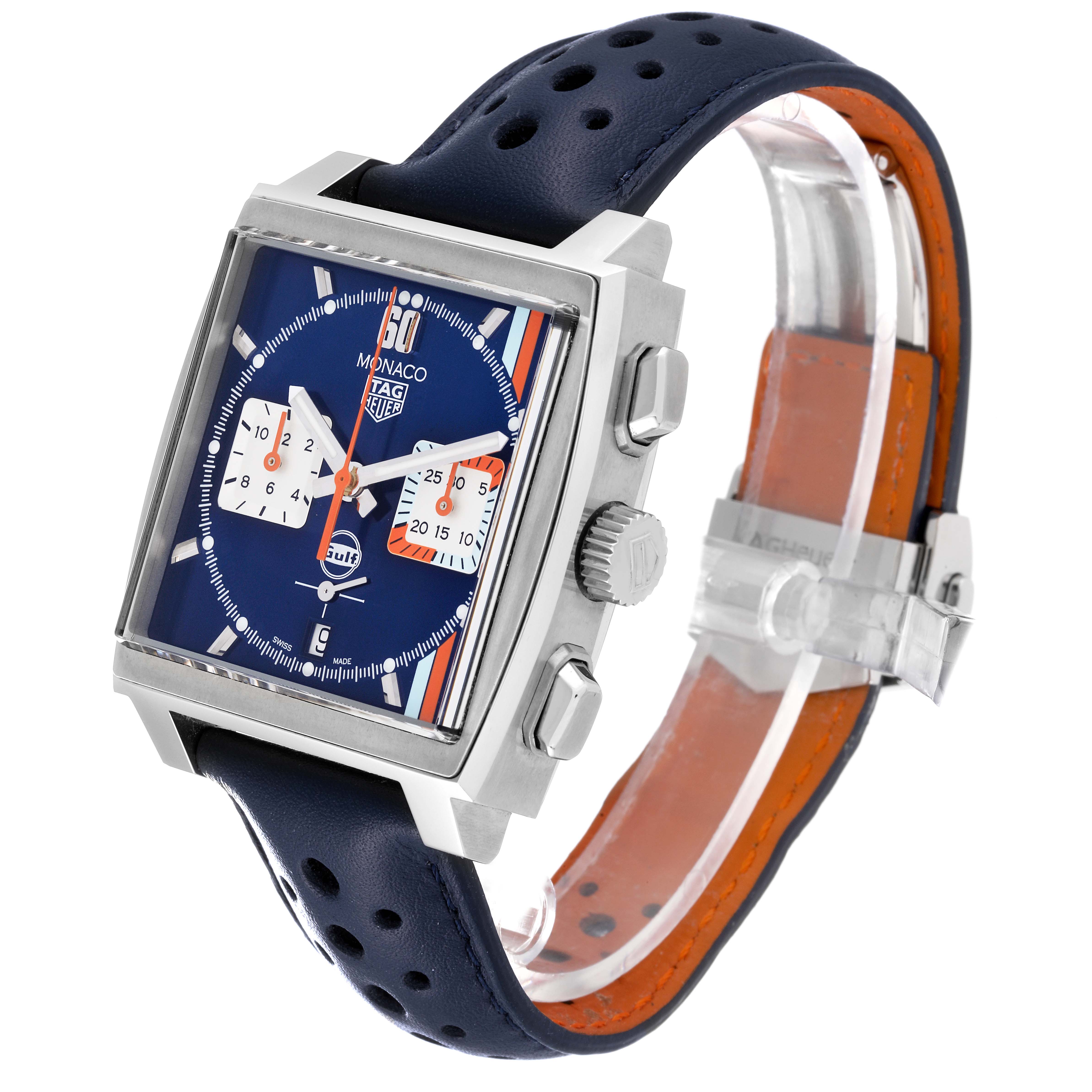 The image shows a side-angle view of the Tag Heuer Monaco CBL2115.FC6494 Men's Stainless Steel Blue Dial CBL2115.FC6494 Men's Stainless Steel Blue Dial watch, highlighting its blue dial, side buttons, and leather strap.