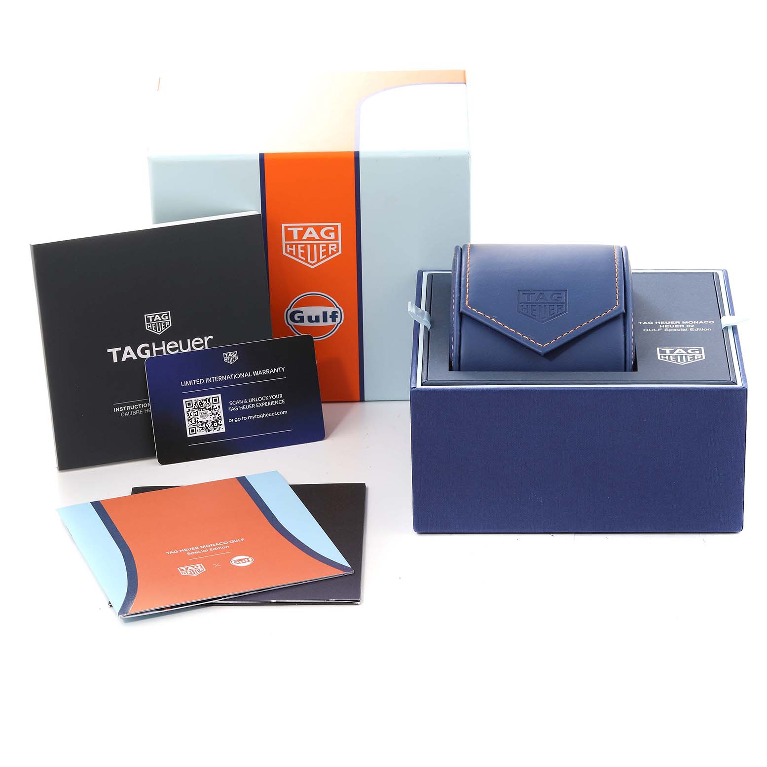 The image shows the packaging, case, and warranty card for a Tag Heuer Monaco CBL2115.FC6494 Men's Stainless Steel Blue Dial CBL2115.FC6494 Men's Stainless Steel Blue Dial model watch.
