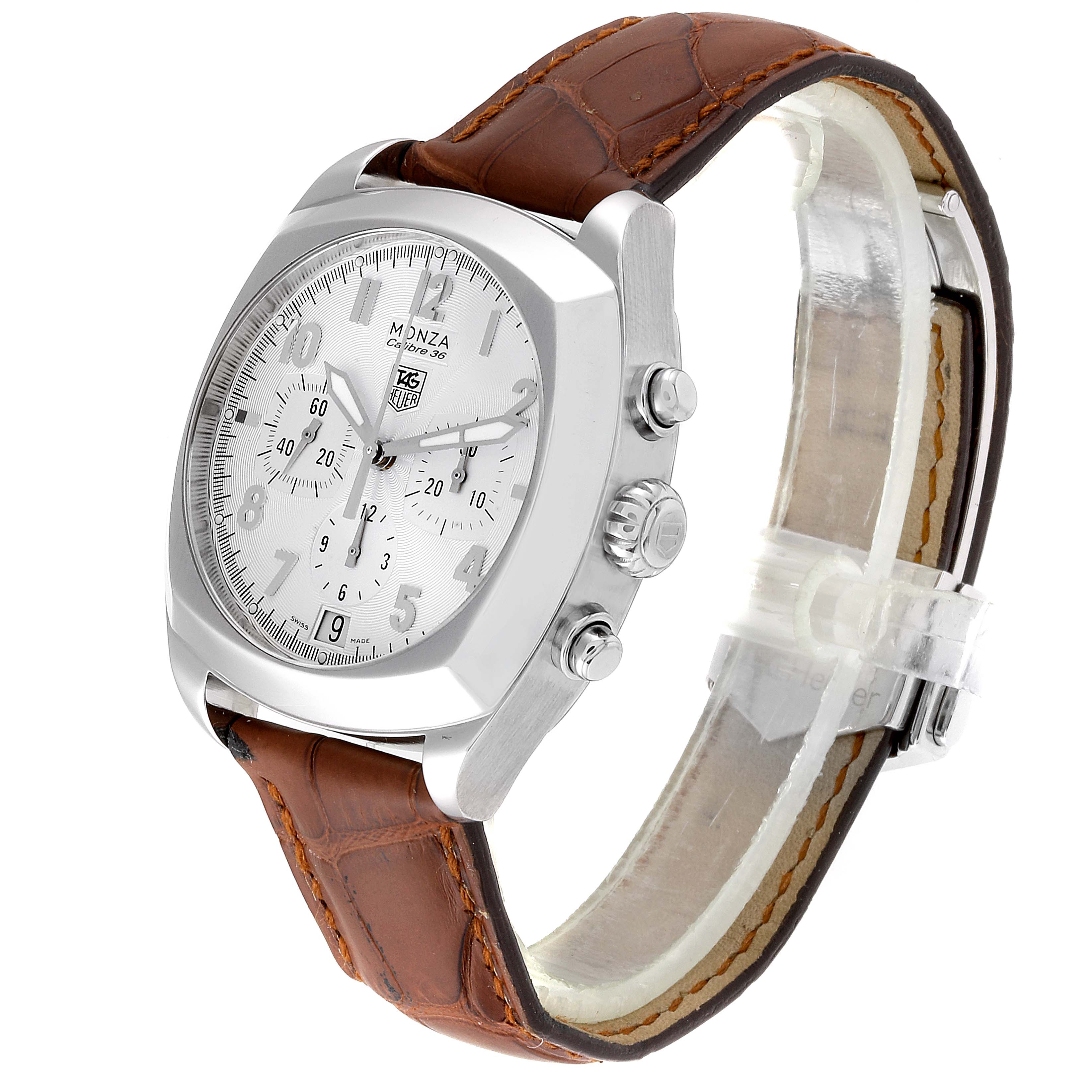 This image shows a side angle of the Tag Heuer Monza CR5111.FC6176 Men's Stainless Steel Silver Dial CR5111.FC6176 Men's Stainless Steel Silver Dial watch, highlighting the face, crown, push buttons, and brown leather strap.