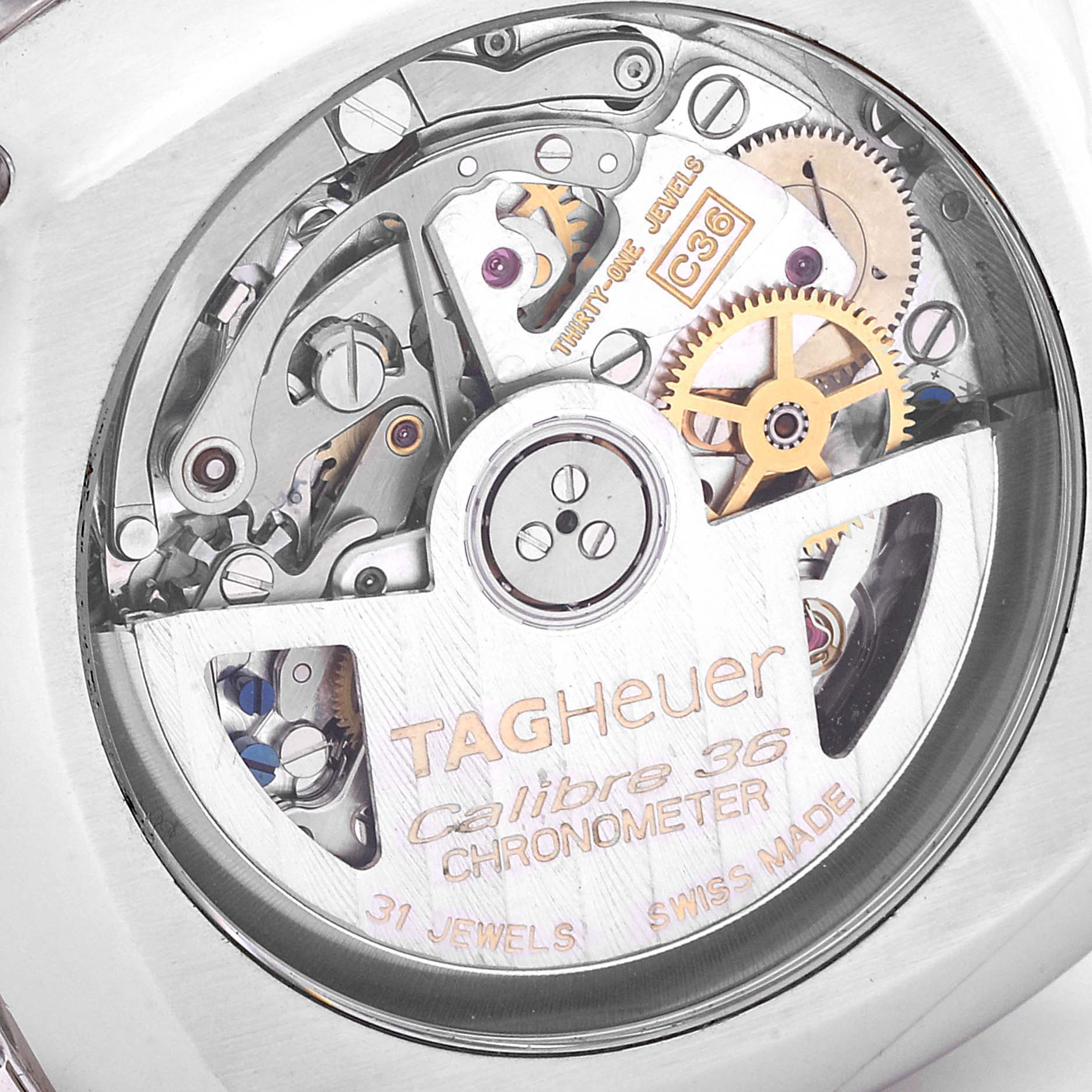 The image shows the intricate inner mechanics of a Tag Heuer Monza CR5111.FC6176 Men's Stainless Steel Silver Dial CR5111.FC6176 Men's Stainless Steel Silver Dial watch, specifically the Calibre 36 movement.