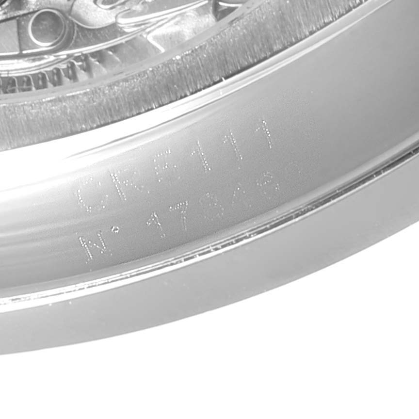 The image shows a close-up of the engraved case back and inner mechanism of the Tag Heuer Monza CR5111.FC6176 Men's Stainless Steel Silver Dial CR5111.FC6176 Men's Stainless Steel Silver Dial watch model.