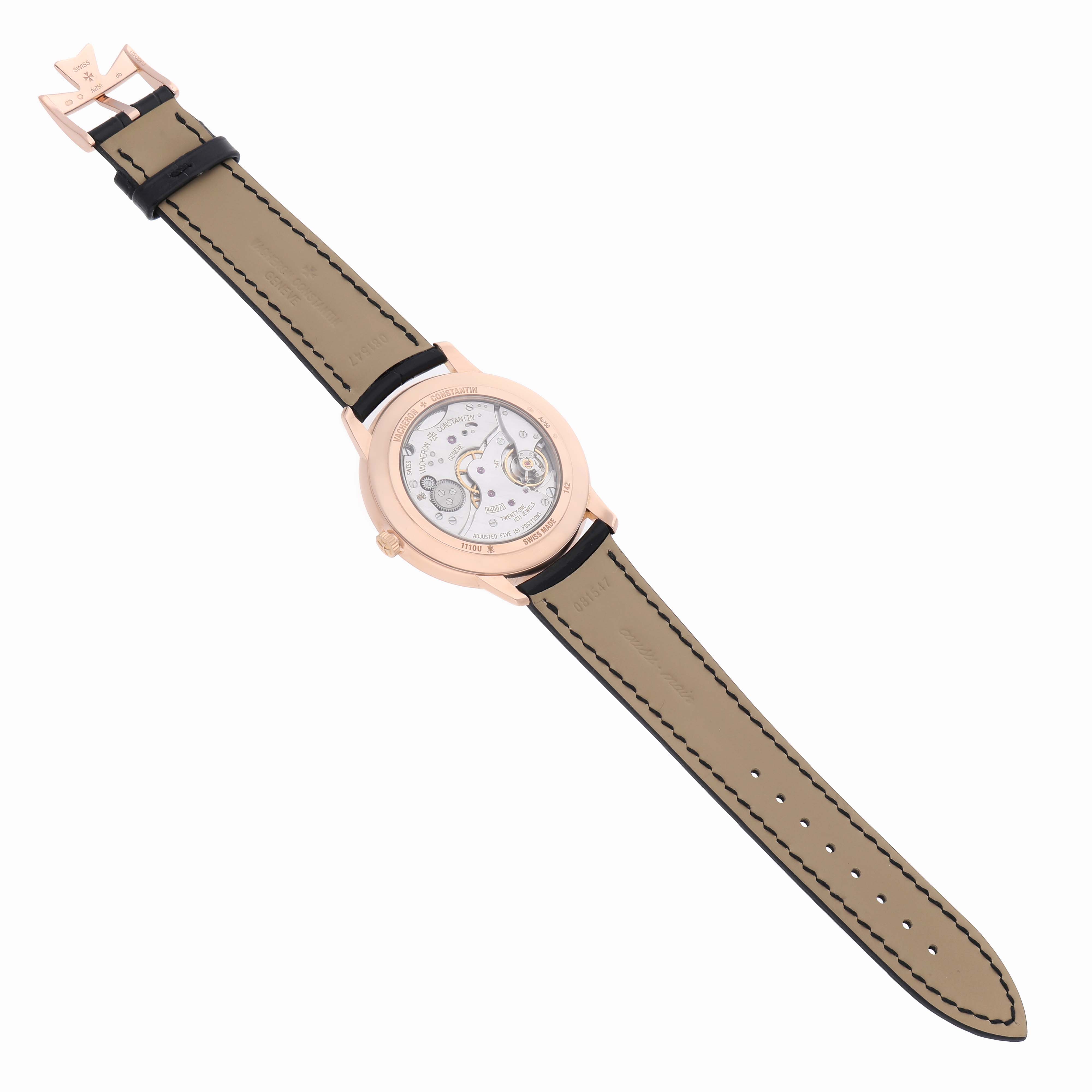 The Vacheron Constantin Patrimony 1110U/000R Men's Rose Gold Silver Dial watch is shown from the back, highlighting its movement through a transparent case back.