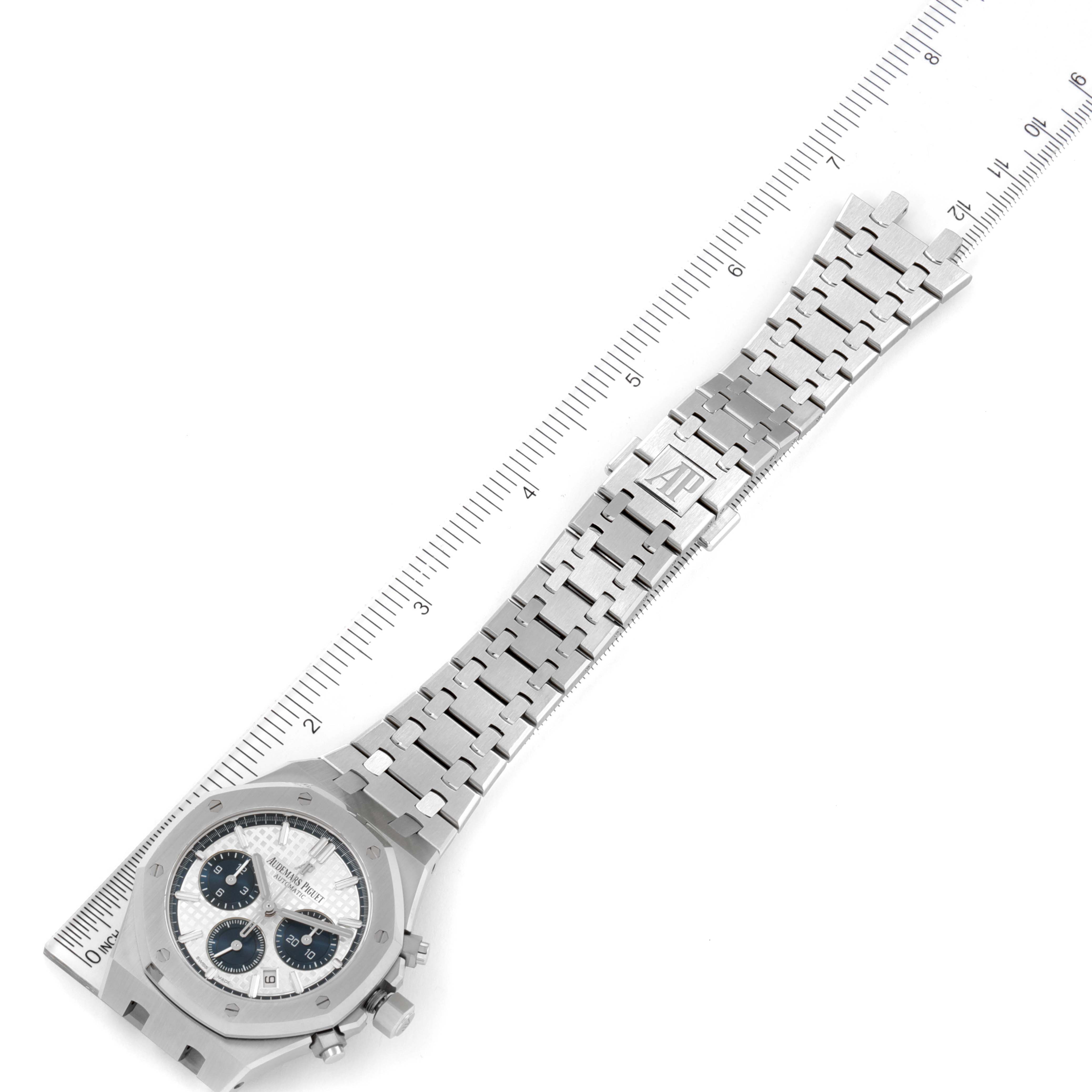 The image shows the Audemars Piguet Royal Oak 26315ST.OO.1256ST.01 Men's Stainless Steel Silver Dial 26315ST.OO.1256ST.01 Men's Stainless Steel Silver Dial watch from a top angle, highlighting the dial, bezel, buttons, and metal bracelet.