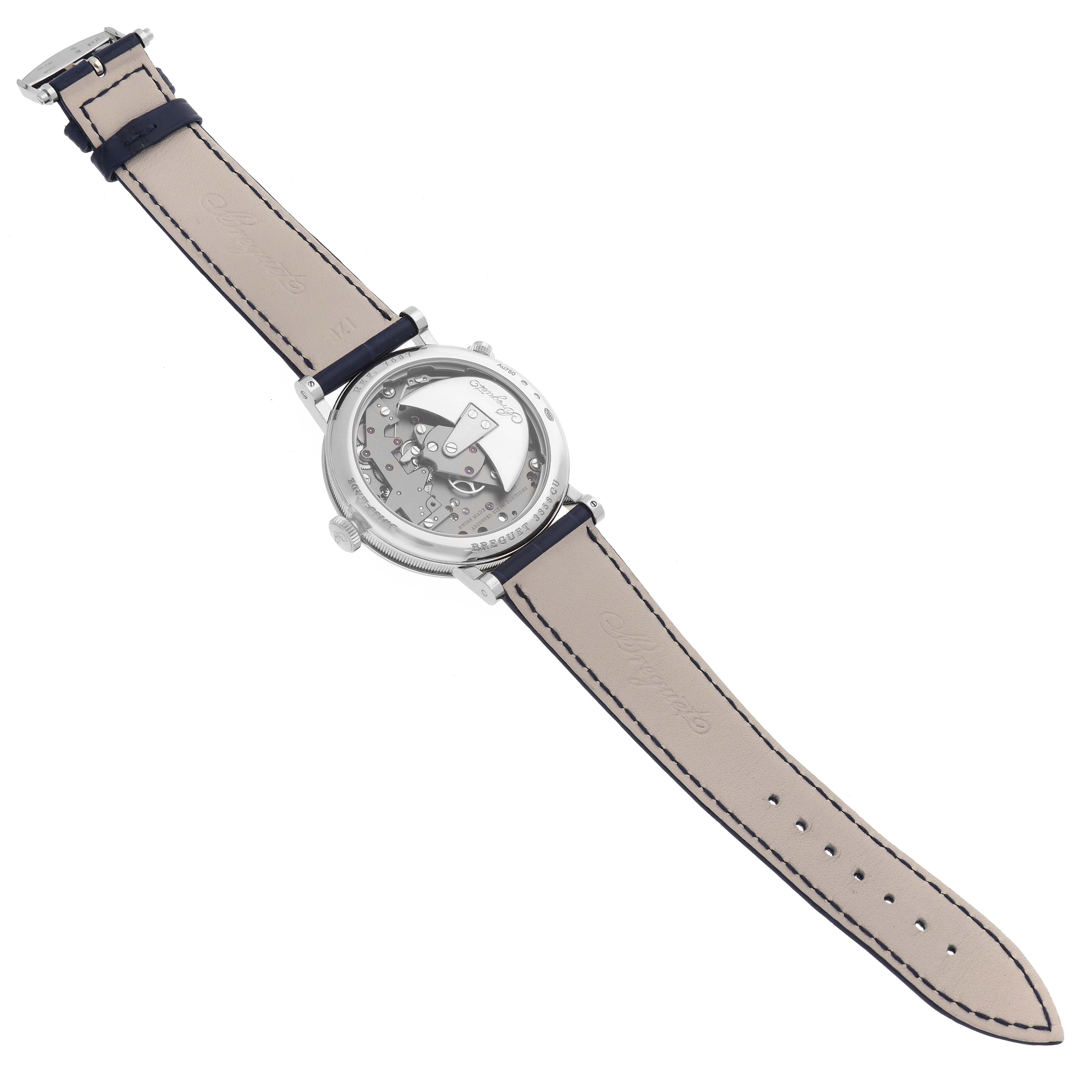 The image shows the back view of a Breguet Tradition 7597BB/GY/9WU Men's White Gold Blue Dial 7597BB/GY/9WU Men's White Gold Blue Dial watch, highlighting its movement and beige leather strap.