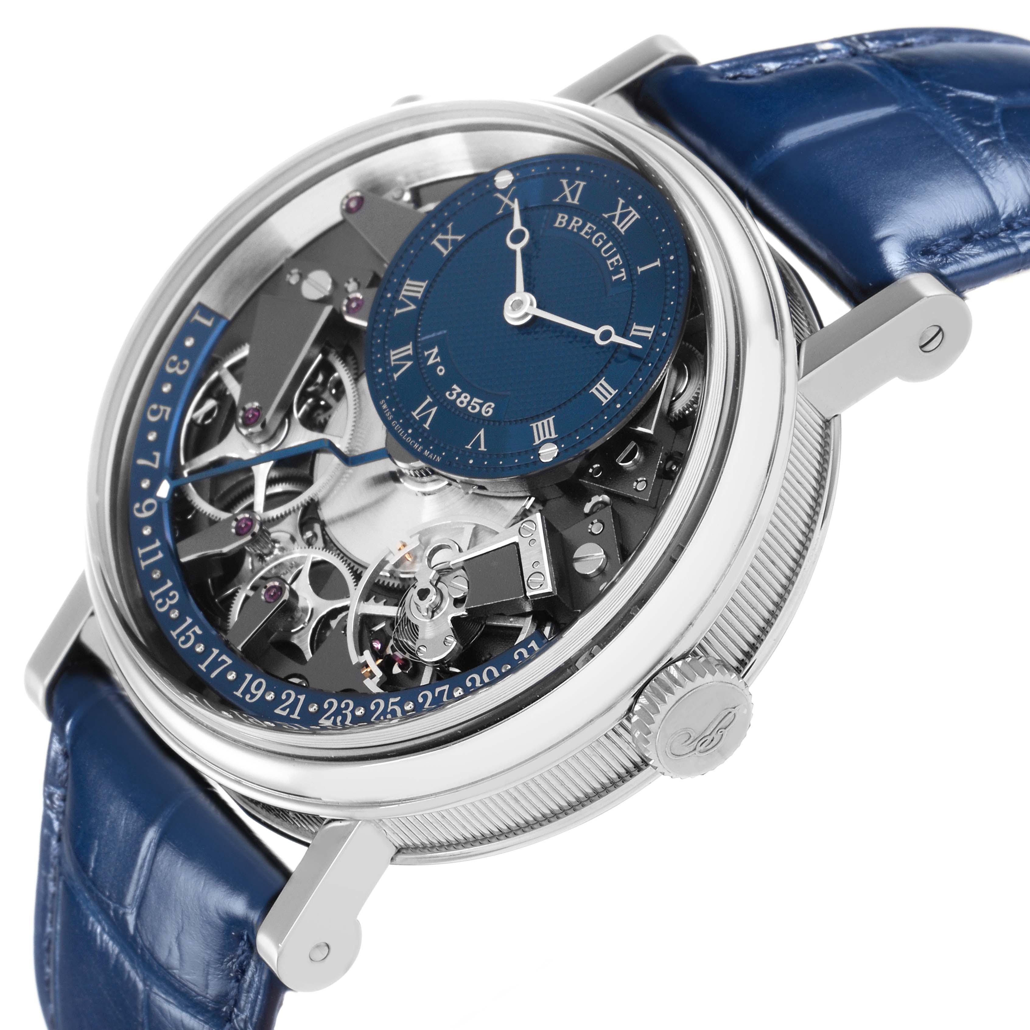 The Breguet Tradition 7597BB/GY/9WU Men's White Gold Blue Dial 7597BB/GY/9WU Men's White Gold Blue Dial watch is shown at an angled side view, highlighting the dial, crown, and mechanical details.