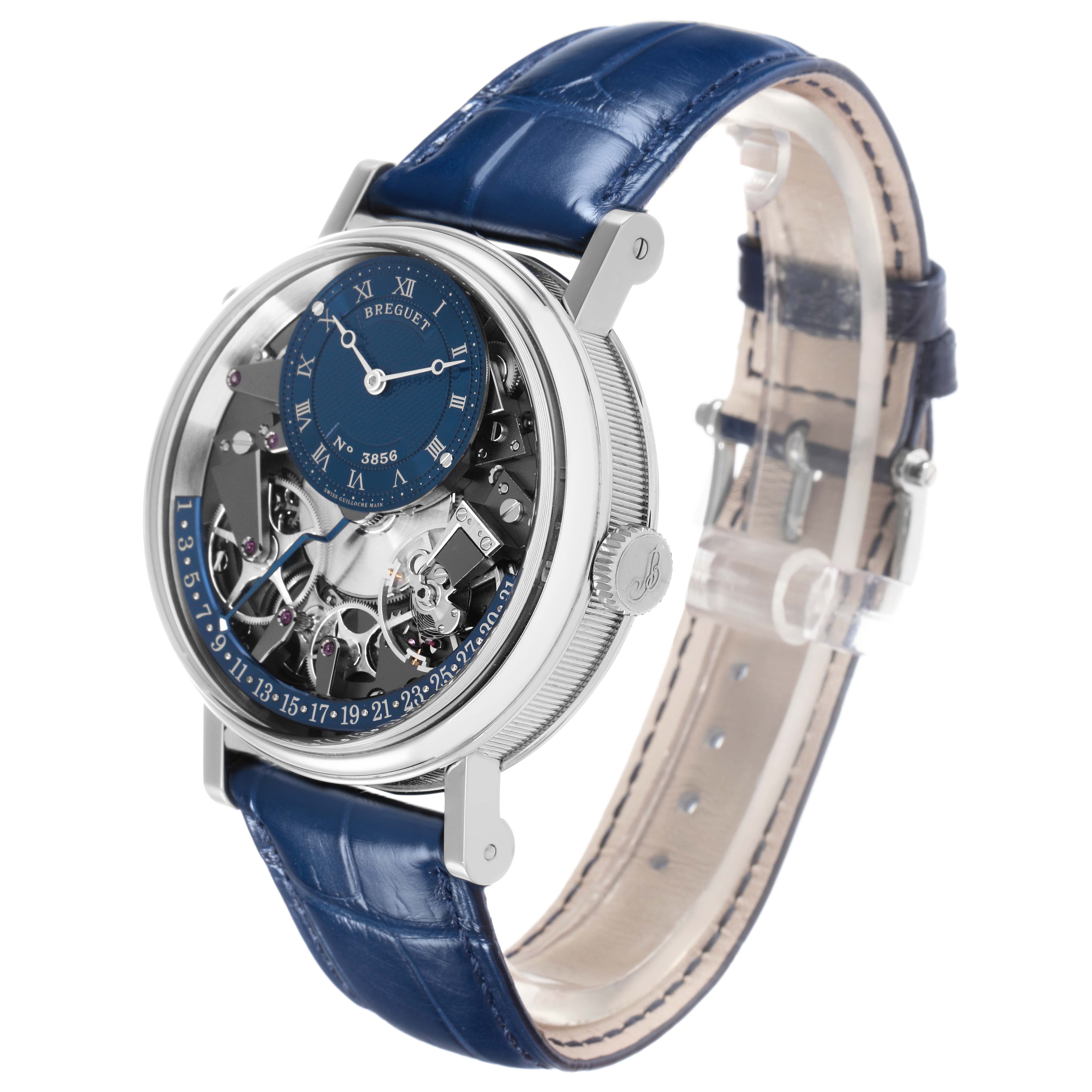 The Breguet Tradition 7597BB/GY/9WU Men's White Gold Blue Dial 7597BB/GY/9WU Men's White Gold Blue Dial watch is shown at a side angle, revealing the dial, crown, and blue leather strap.