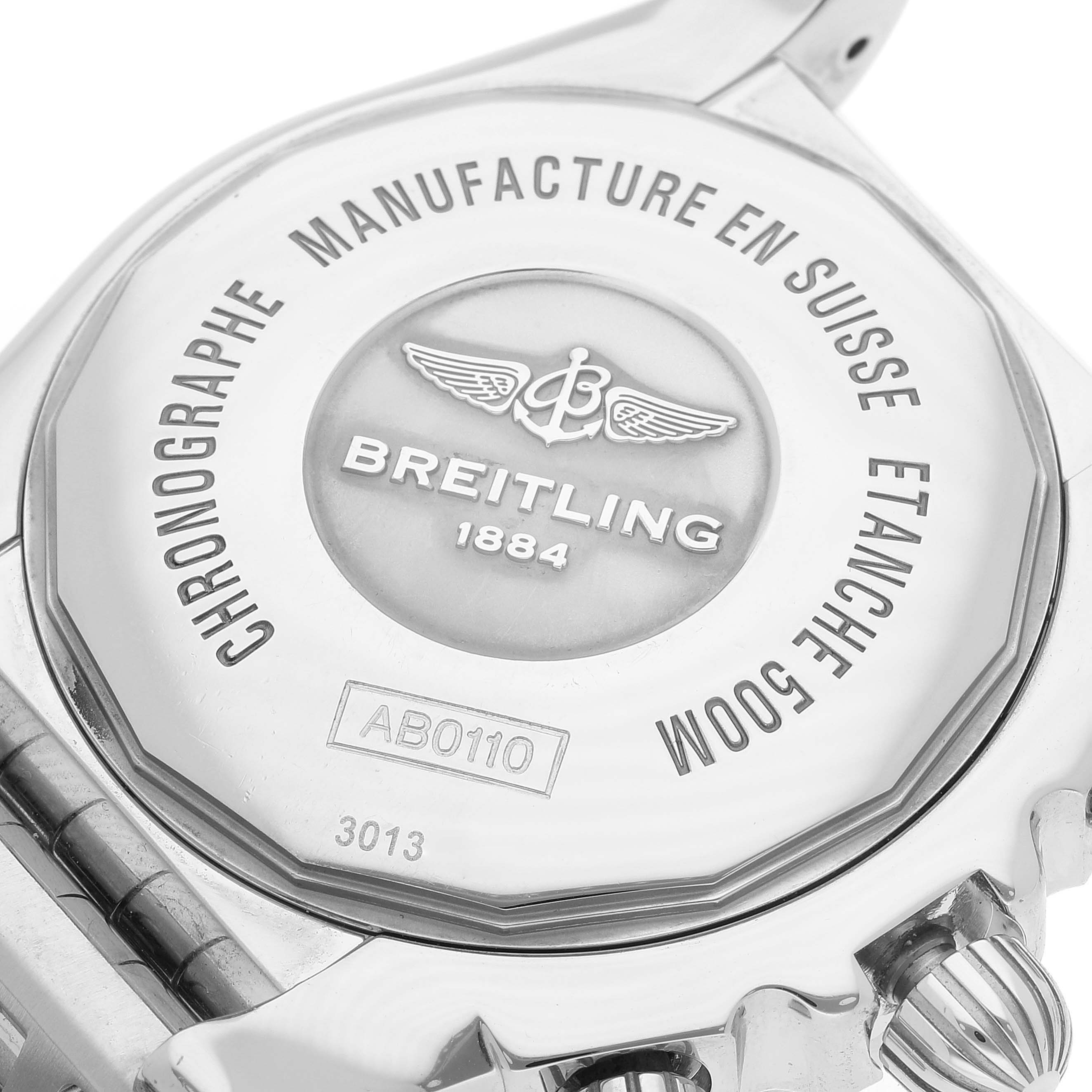 This image shows the back case of the Breitling Chronomat AB0110 Men
s Stainless Steel Black Dial AB0110 Men
s Stainless Steel Black Dial watch, highlighting its engravings and stainless steel finish.