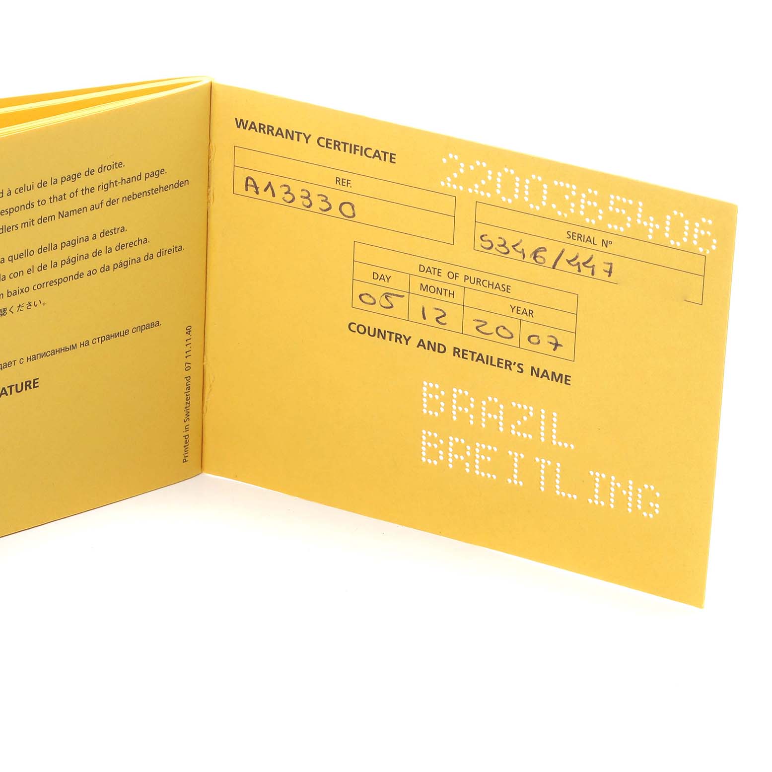 The image shows a Breitling Navitimer A13330 Men
s Stainless Steel Black Dial A13330 Men
s Stainless Steel Black Dial warranty certificate booklet, open to display purchase details and serial numbers.