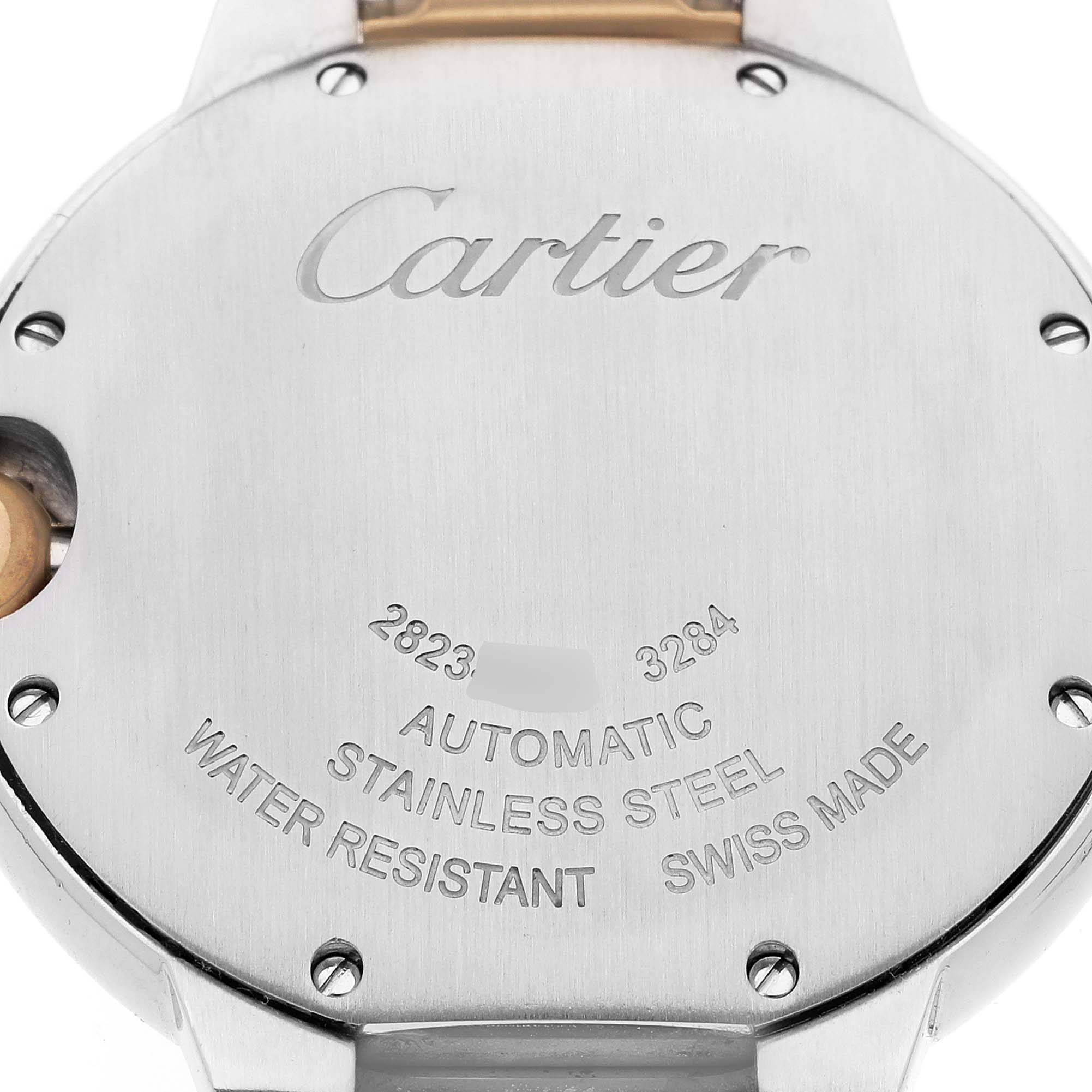 The image shows the back case of a Ballon Bleu model by Cartier, highlighting its engraving and specifications.