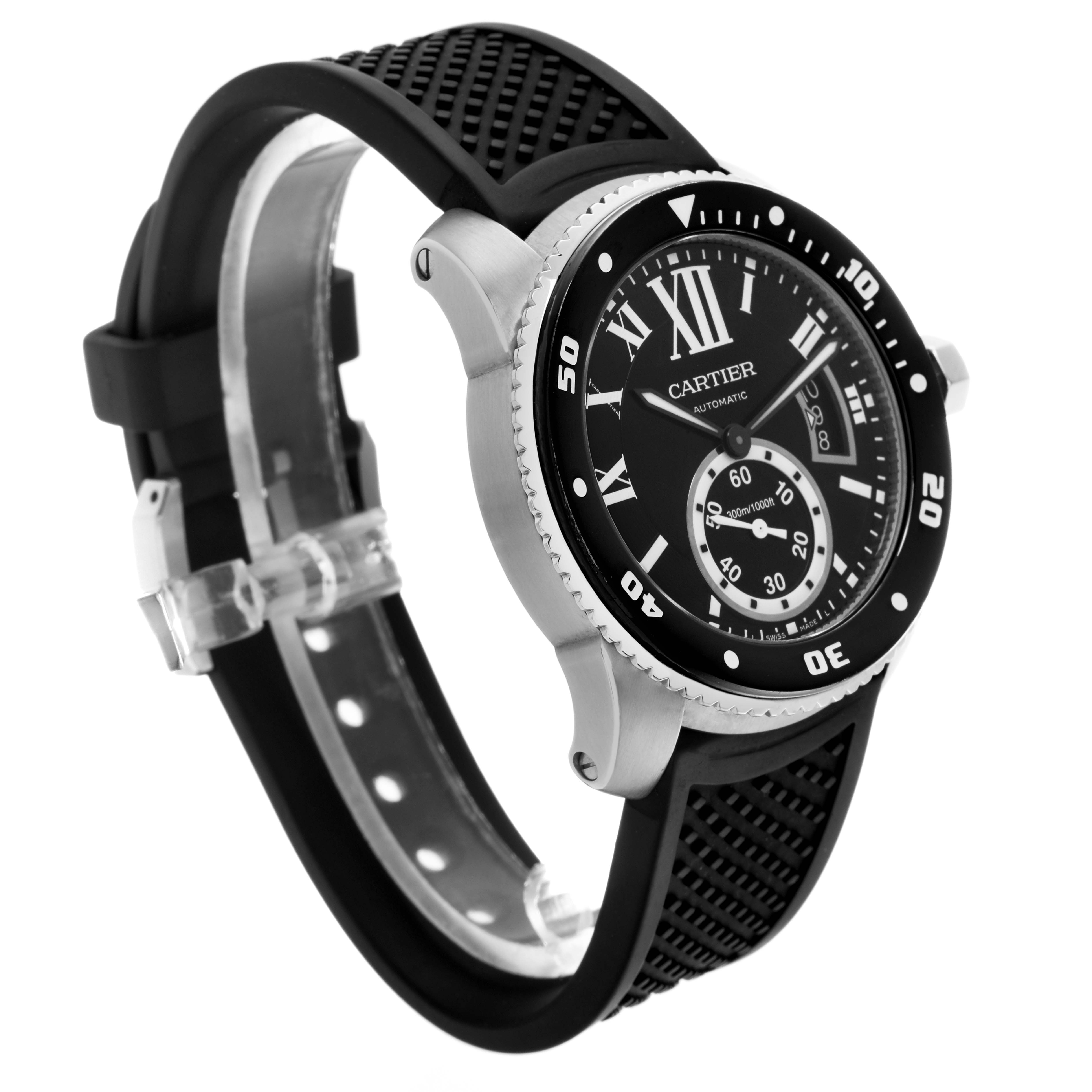 The Calibre de Cartier watch is shown from a three-quarter angle, displaying the face, bezel, and black strap.