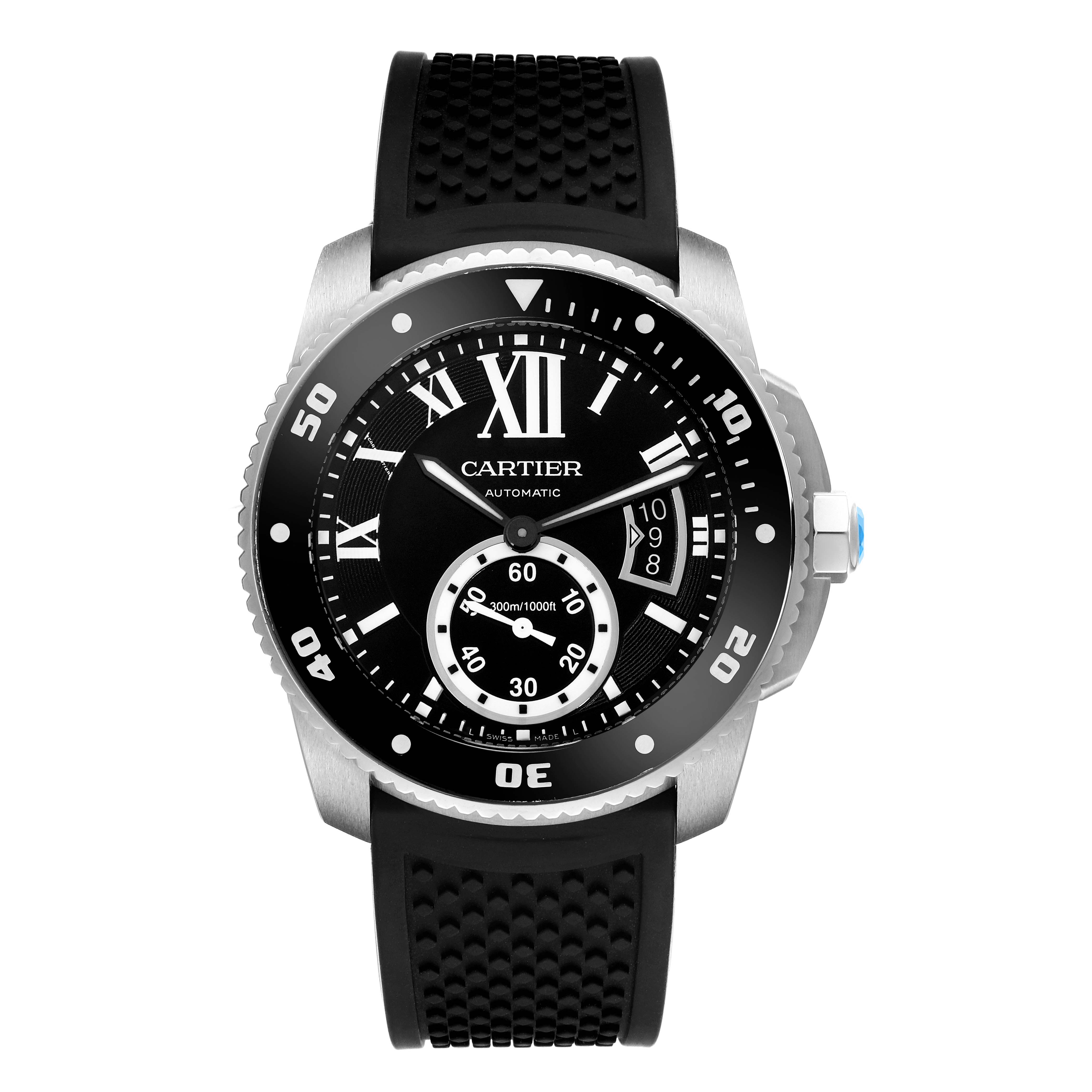 The Calibre de Cartier watch is shown from a top-down angle, highlighting the black dial, bezel, and black strap.