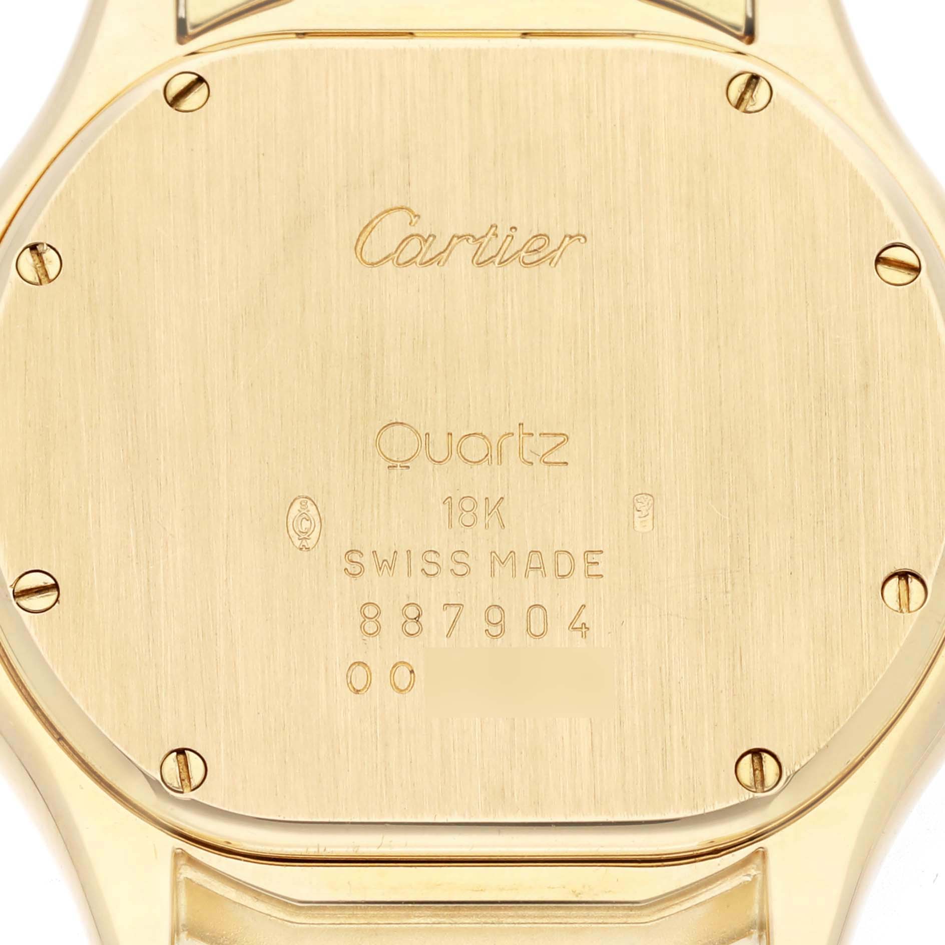 The image shows the back of a Cartier Panthere W25013B9 Men
s Yellow Gold Silver Dial W25013B9 Men
s Yellow Gold Silver Dial watch, highlighting its inscriptions and screws.