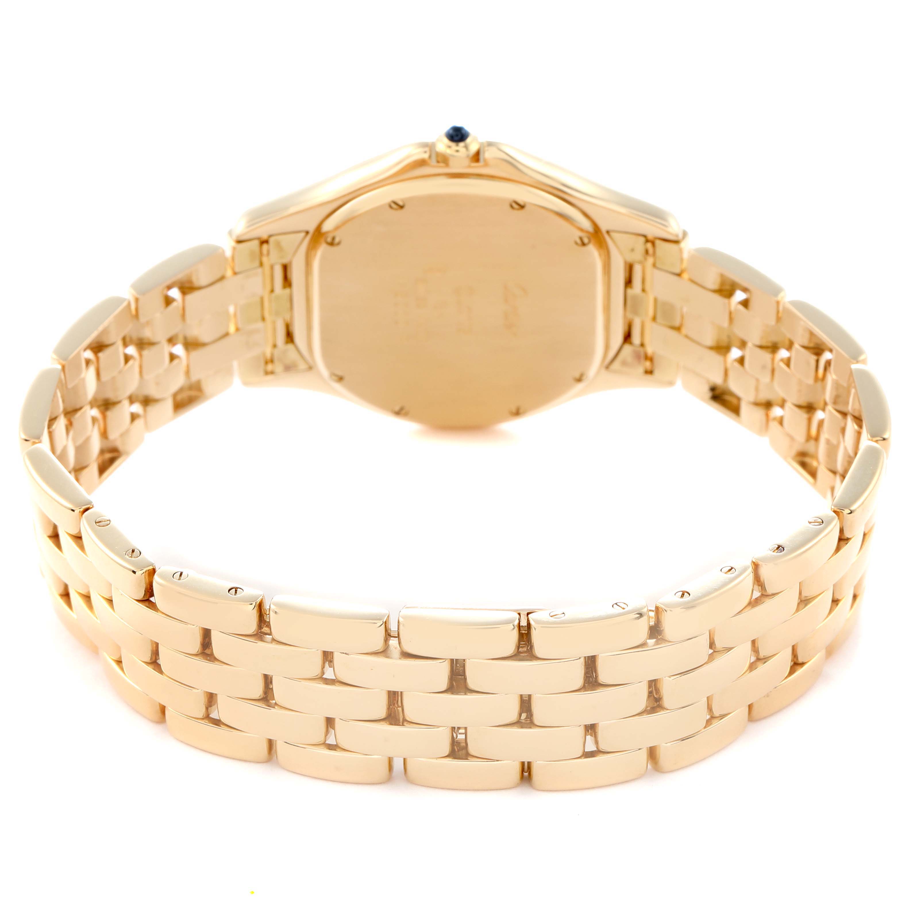 The Cartier Panthère watch is shown from the back, highlighting the case back and bracelet links in a gold finish.