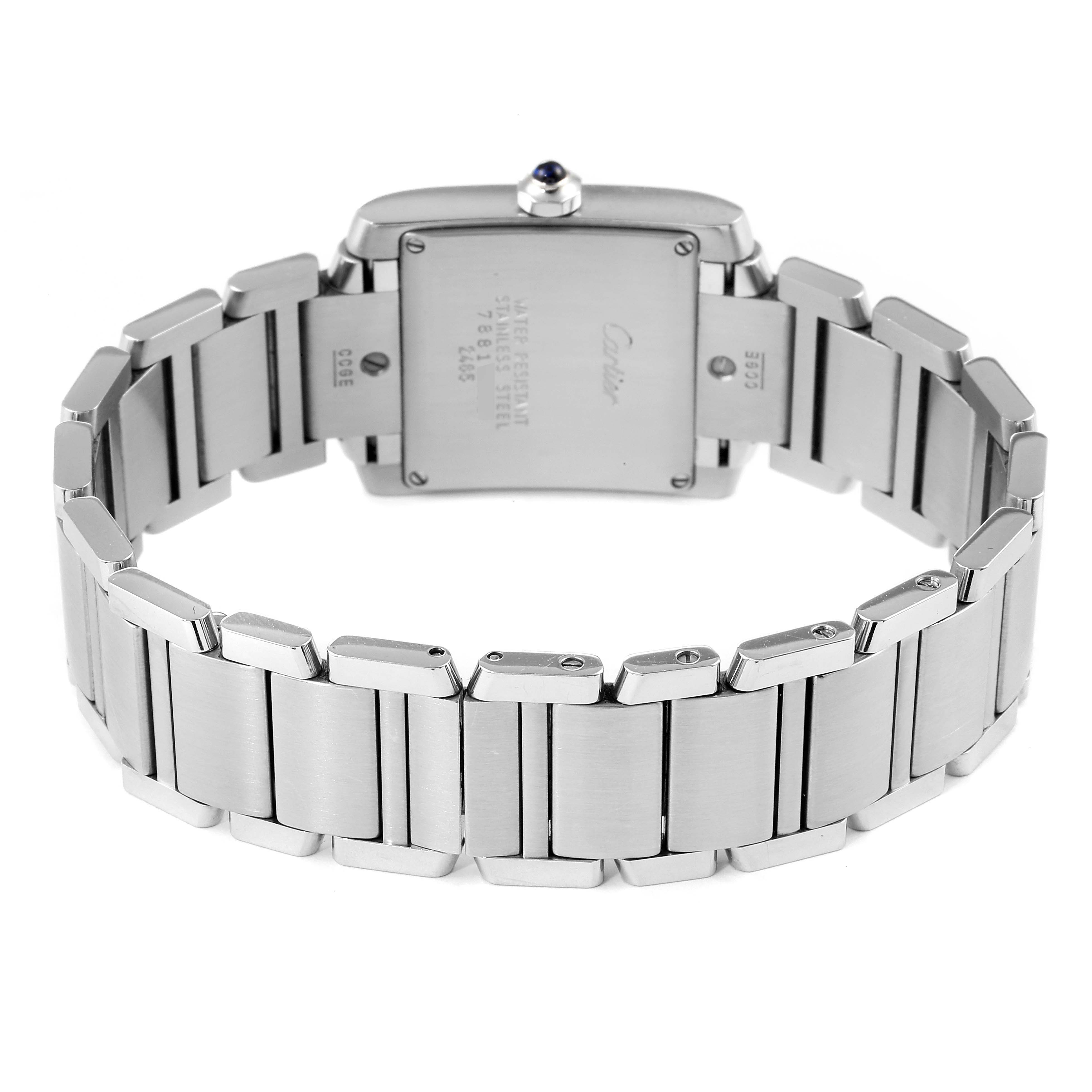This image shows the back view of the Cartier Tank Française watch, highlighting the stainless steel bracelet and case back.
