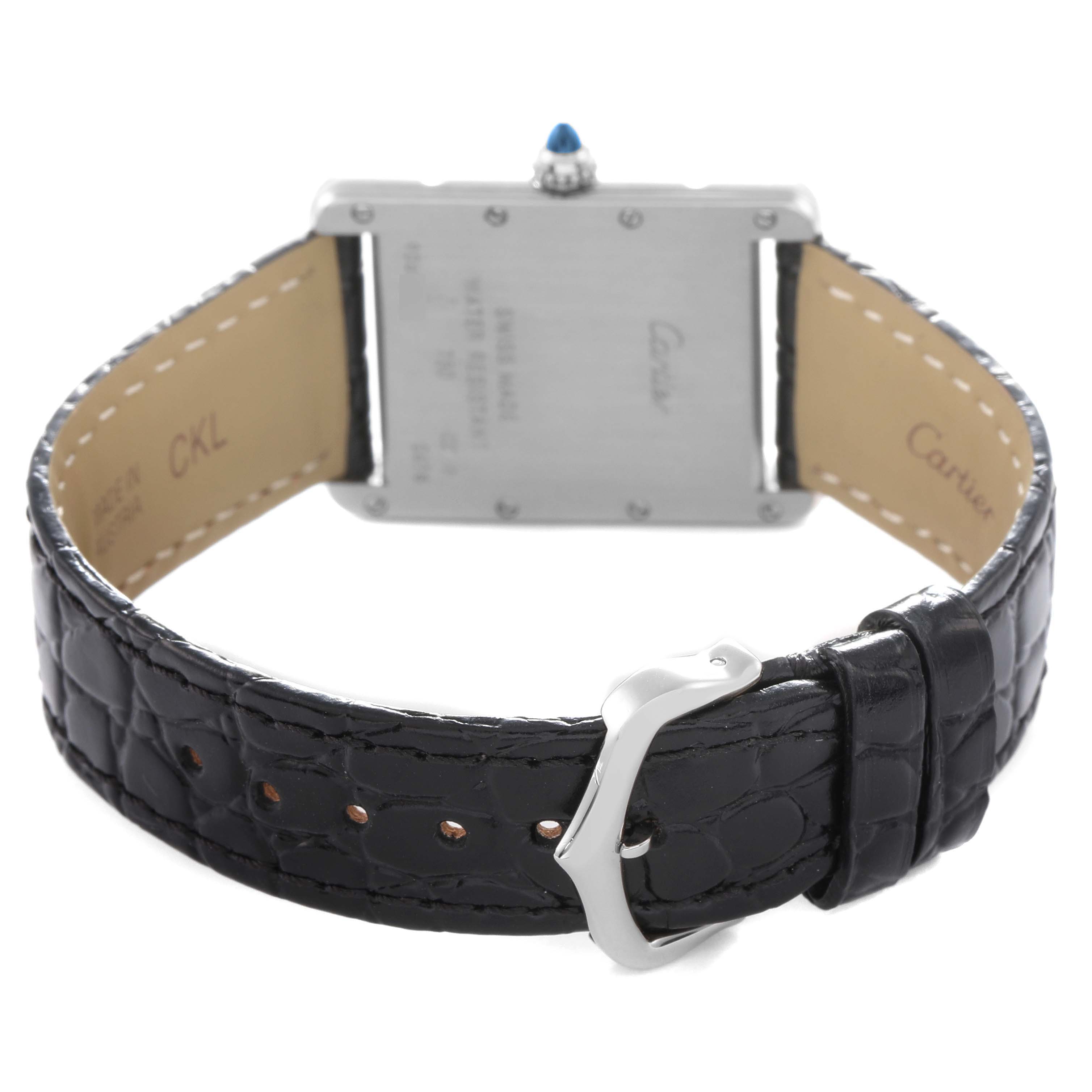 The image shows the back of a Cartier Tank Louis W1540956 Men
s White Gold Silver Dial W1540956 Men
s White Gold Silver Dial watch, highlighting the leather strap and clasp, with the watch case back visible.