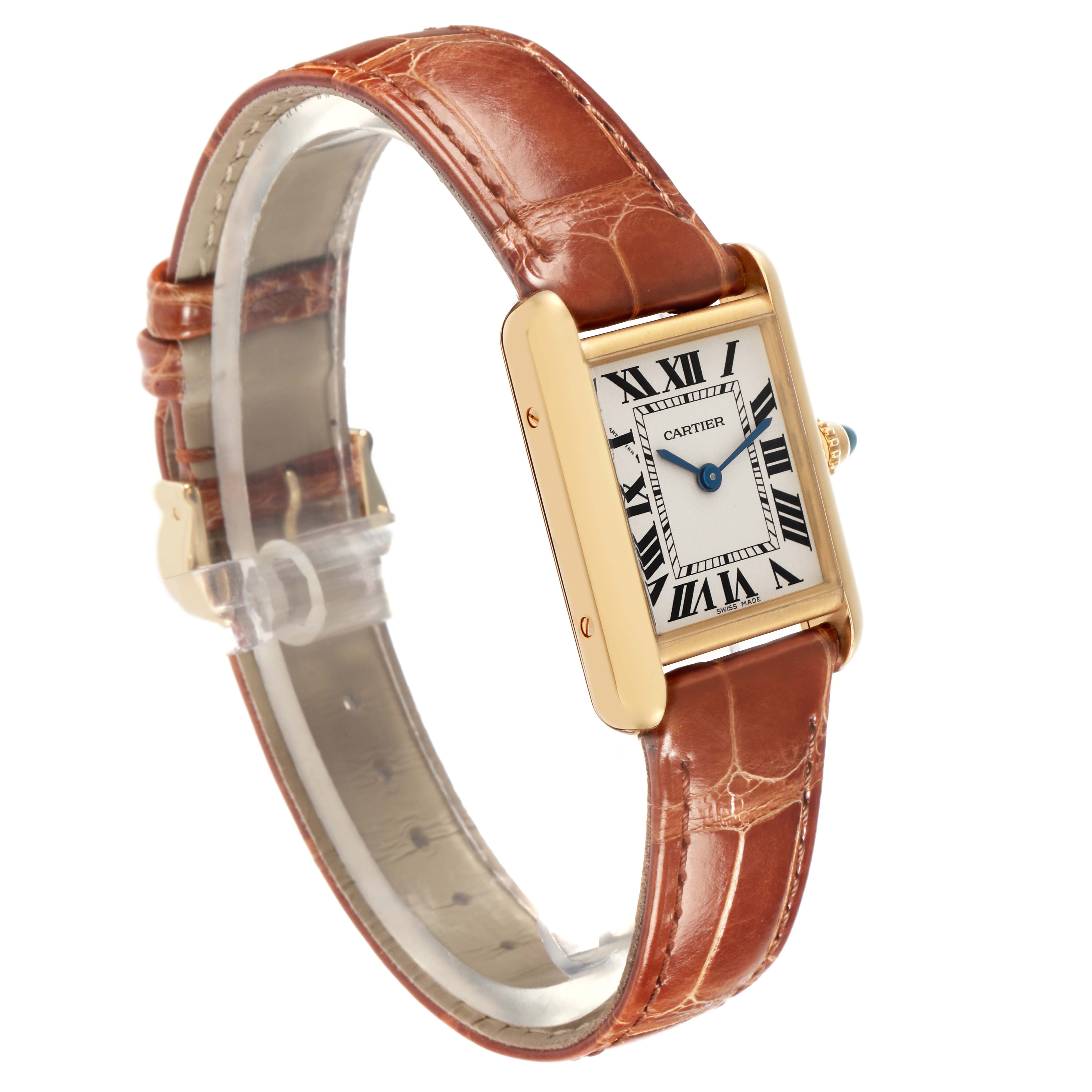 The Cartier Tank Louis W1529856 Women
s Yellow Gold Silver Dial W1529856 Women
s Yellow Gold Silver Dial watch is shown at an angled side view, highlighting the rectangular face, blue hands, and leather strap.
