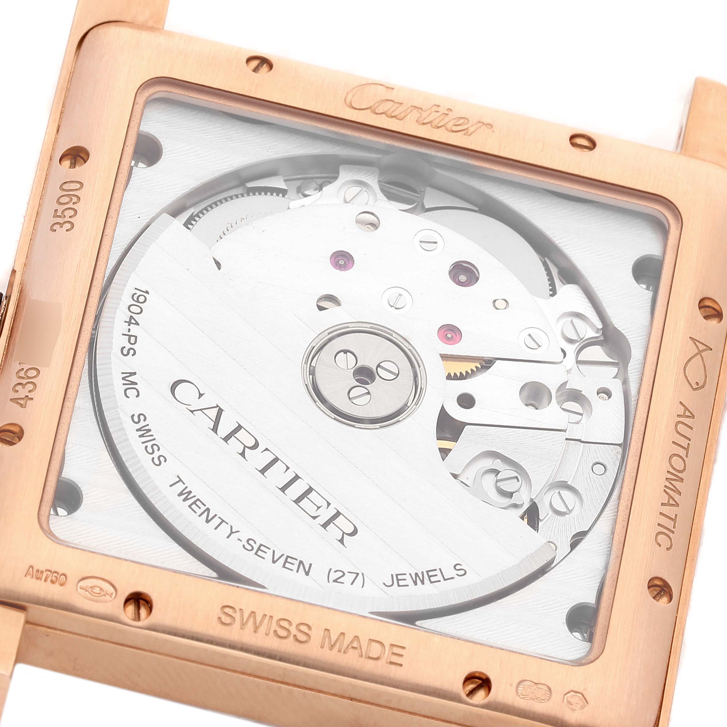 The image shows the back of the Cartier Tank MC WGTA0014 Men's Rose Gold Grey Dial WGTA0014 Men's Rose Gold Grey Dial watch, highlighting its automatic movement and intricate mechanism.