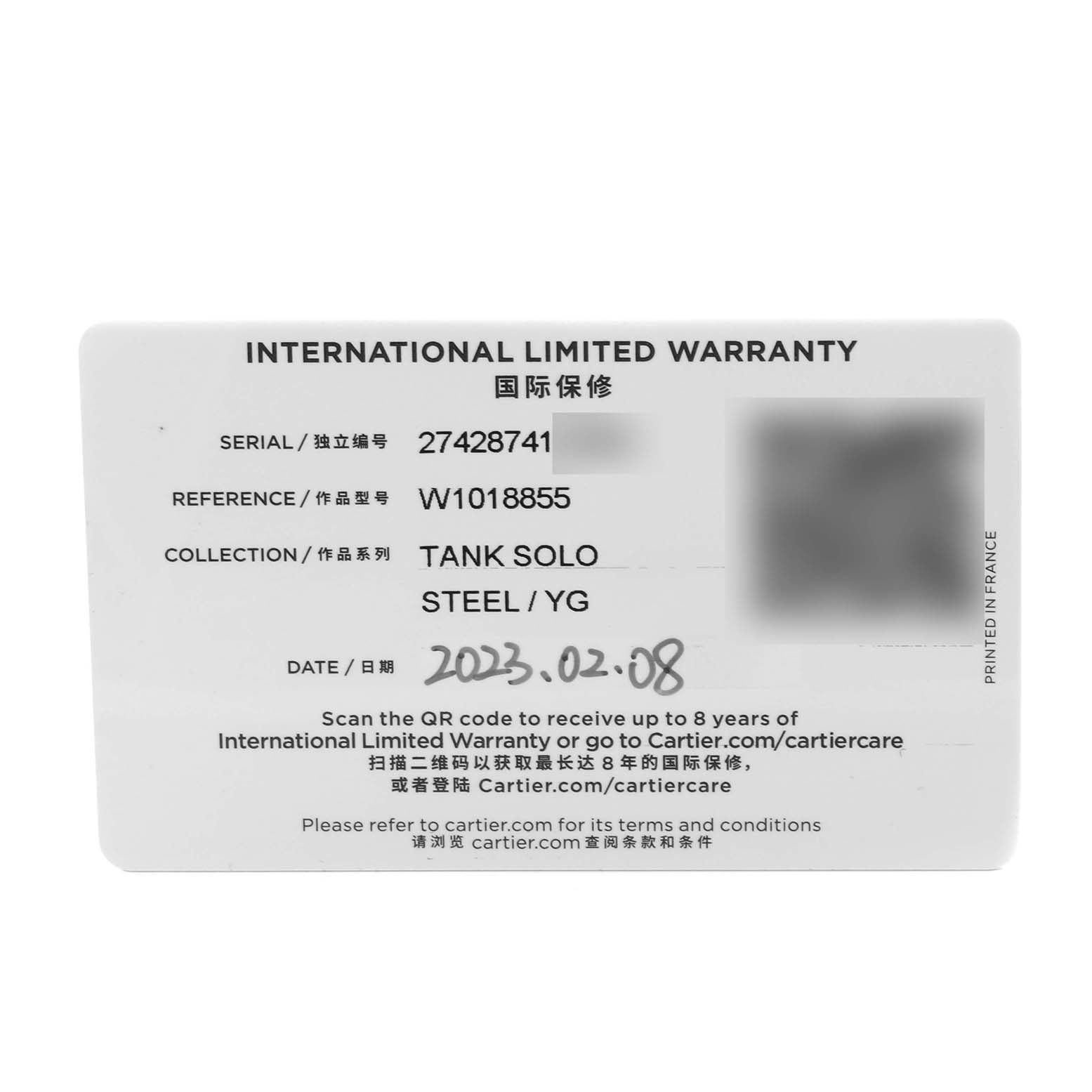 The image is of an International Limited Warranty card for a Cartier Tank Solo W1018855 Men's Steel and Gold (two tone) Silver Dial W1018855 Men's Steel and Gold (two tone) Silver Dial model, showing serial, reference numbers, and purchase date.