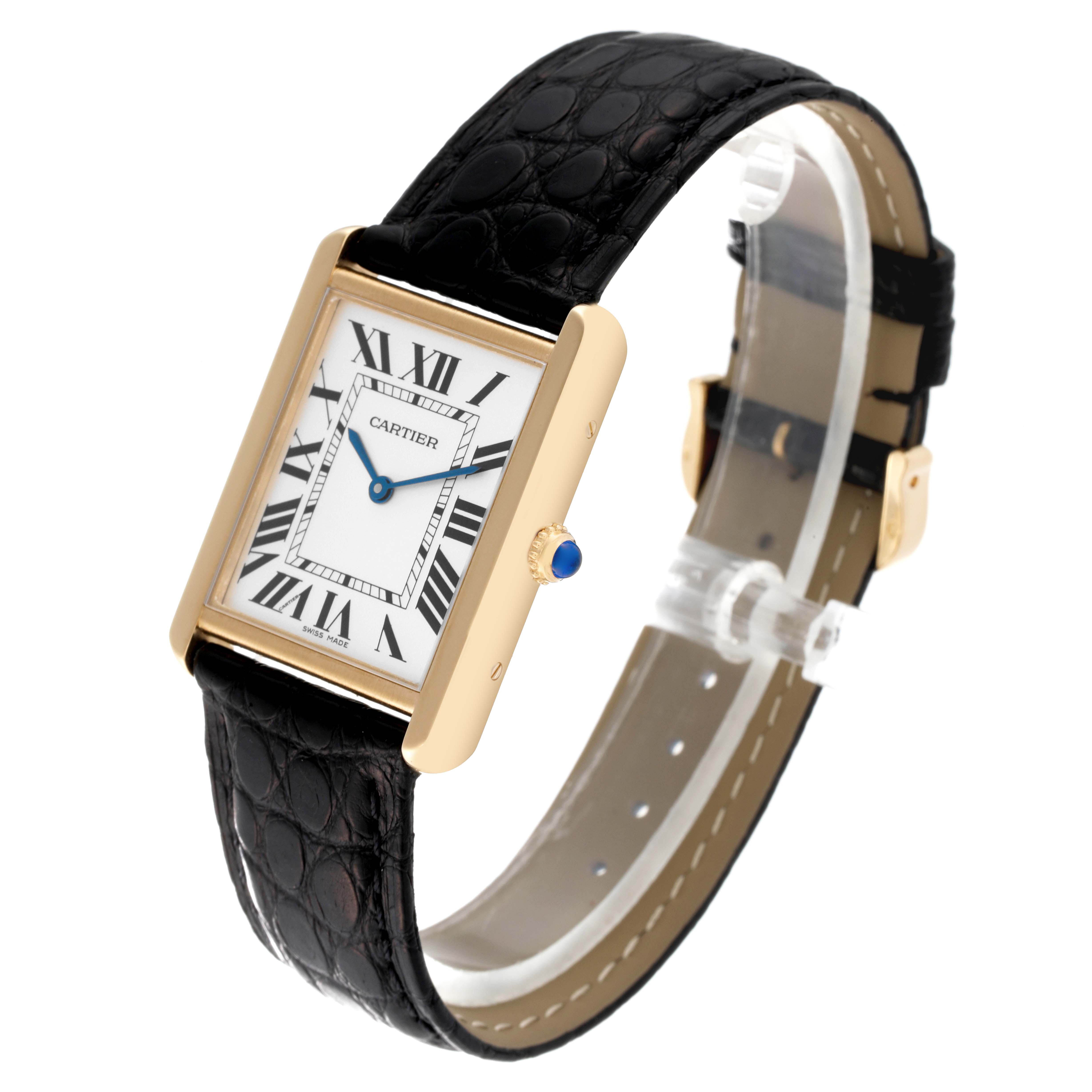 The image shows a Cartier Tank Solo W1018855 Men's Steel and Gold (two tone) Silver Dial W1018855 Men's Steel and Gold (two tone) Silver Dial watch at a slight angle highlighting its gold case, Roman numeral dial, black leather strap, and blue cabochon crown.