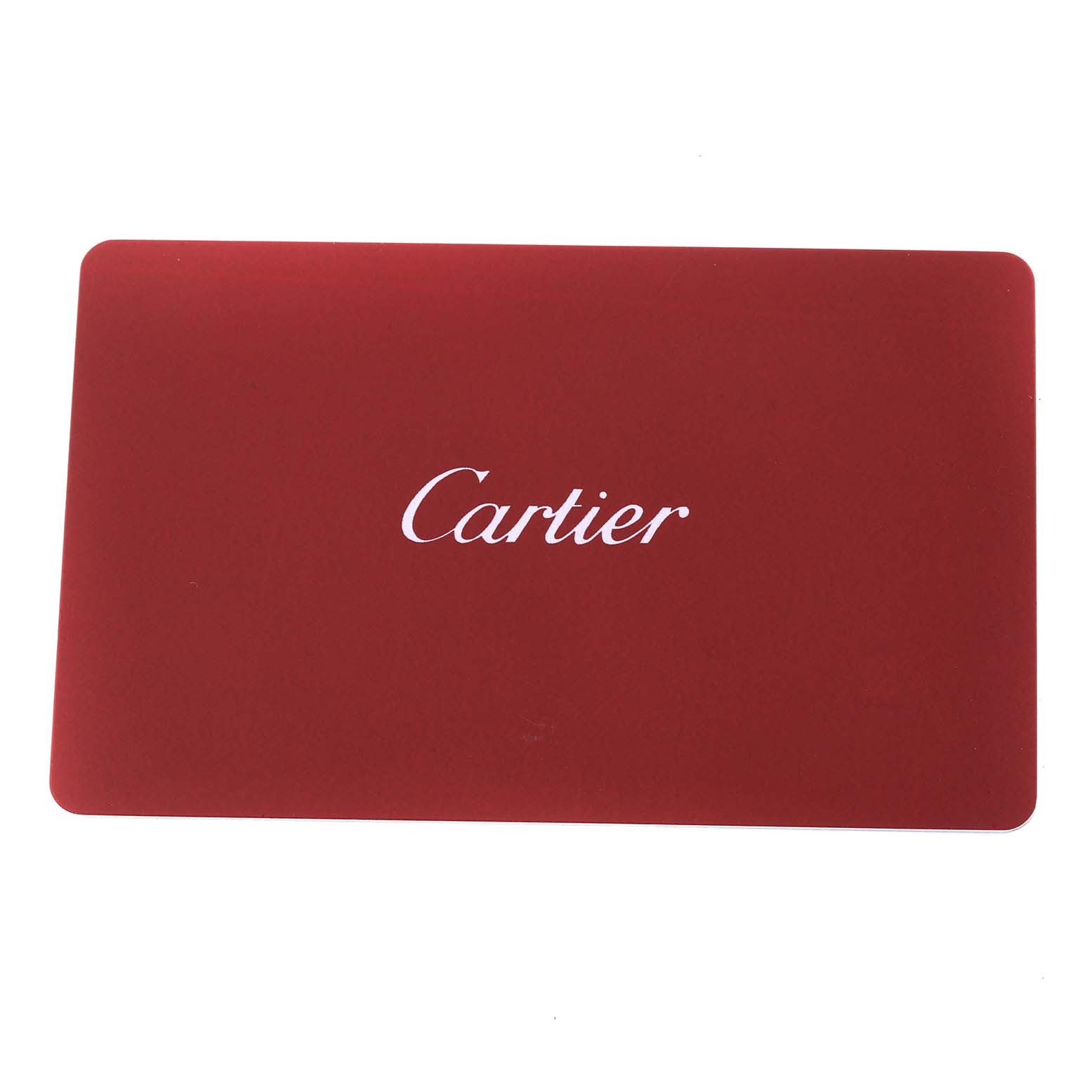 This image shows a red Cartier card commonly included with the Tank Solo model watch by Cartier.