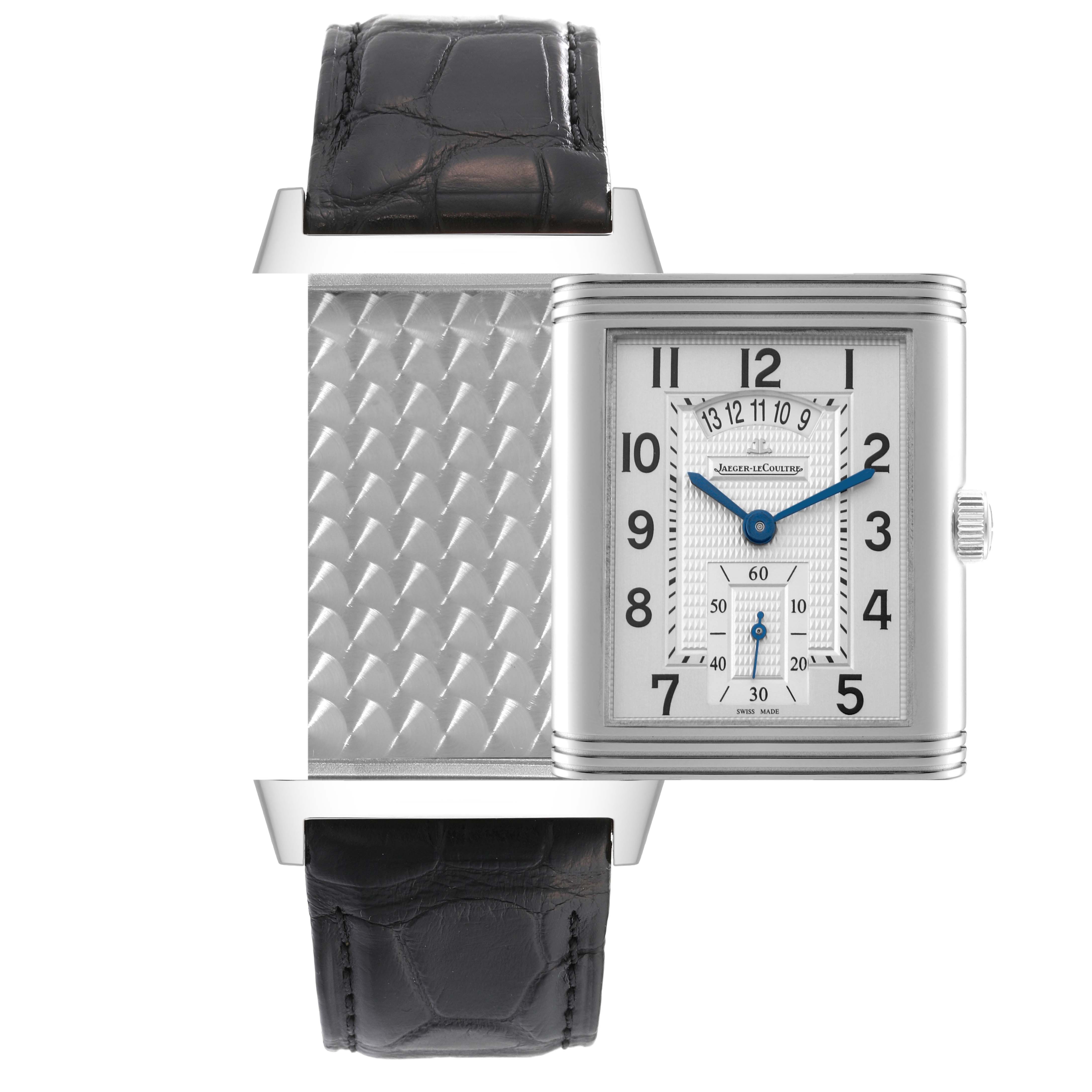 The image shows a front view of the Jaeger LeCoultre Reverso Q3748421 Men's Stainless Steel Silver Dial Q3748421 Men's Stainless Steel Silver Dial watch, displaying both the patterned back and the silver dial with blue hands.