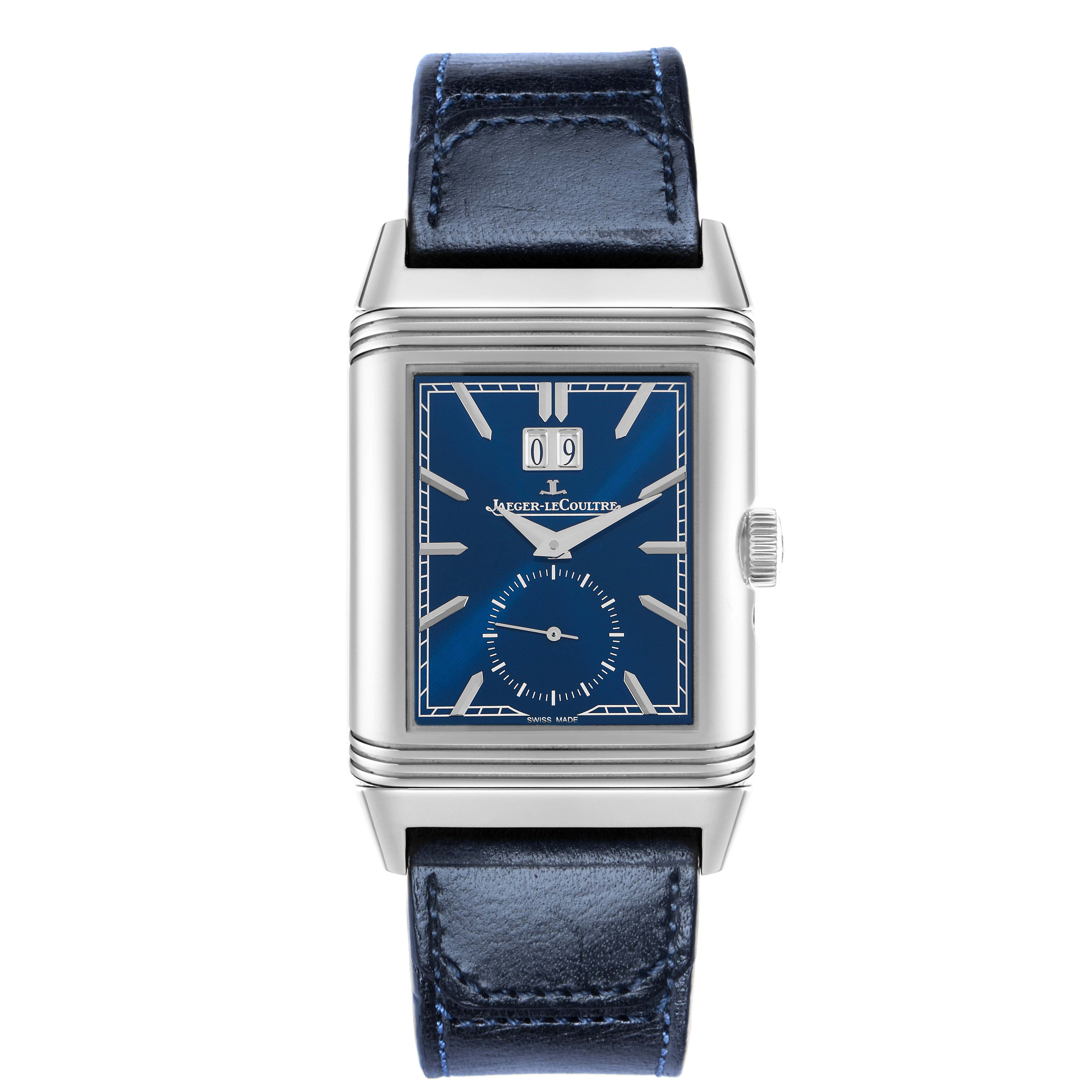 The Jaeger-LeCoultre Reverso watch is shown from the front, displaying the blue dial, rectangular case, and leather strap.