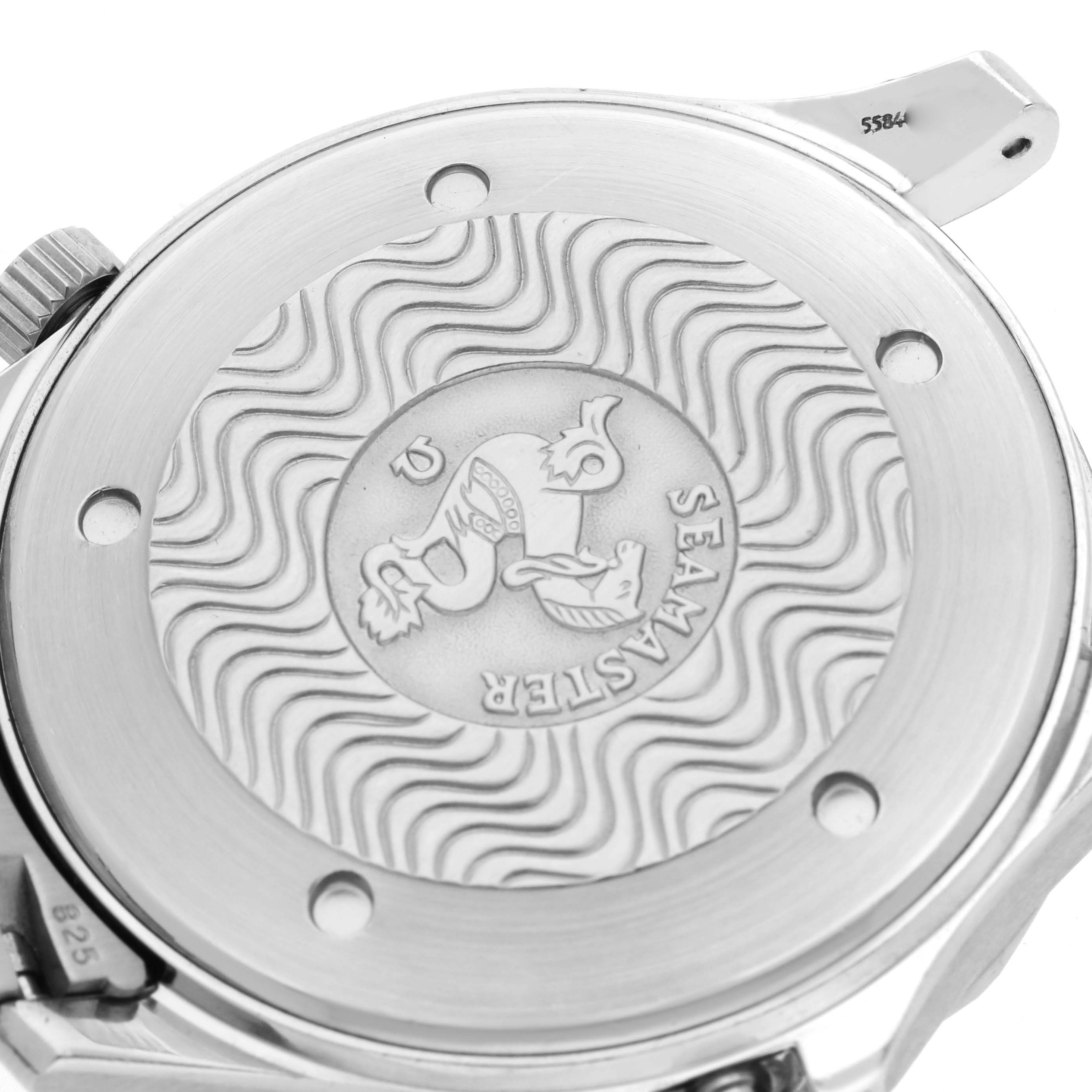 The image shows the back casing of an Omega Seamaster 2541.80.00 Men
s Stainless Steel Blue Dial 2541.80.00 Men
s Stainless Steel Blue Dial watch, featuring engraved wave patterns and emblem.