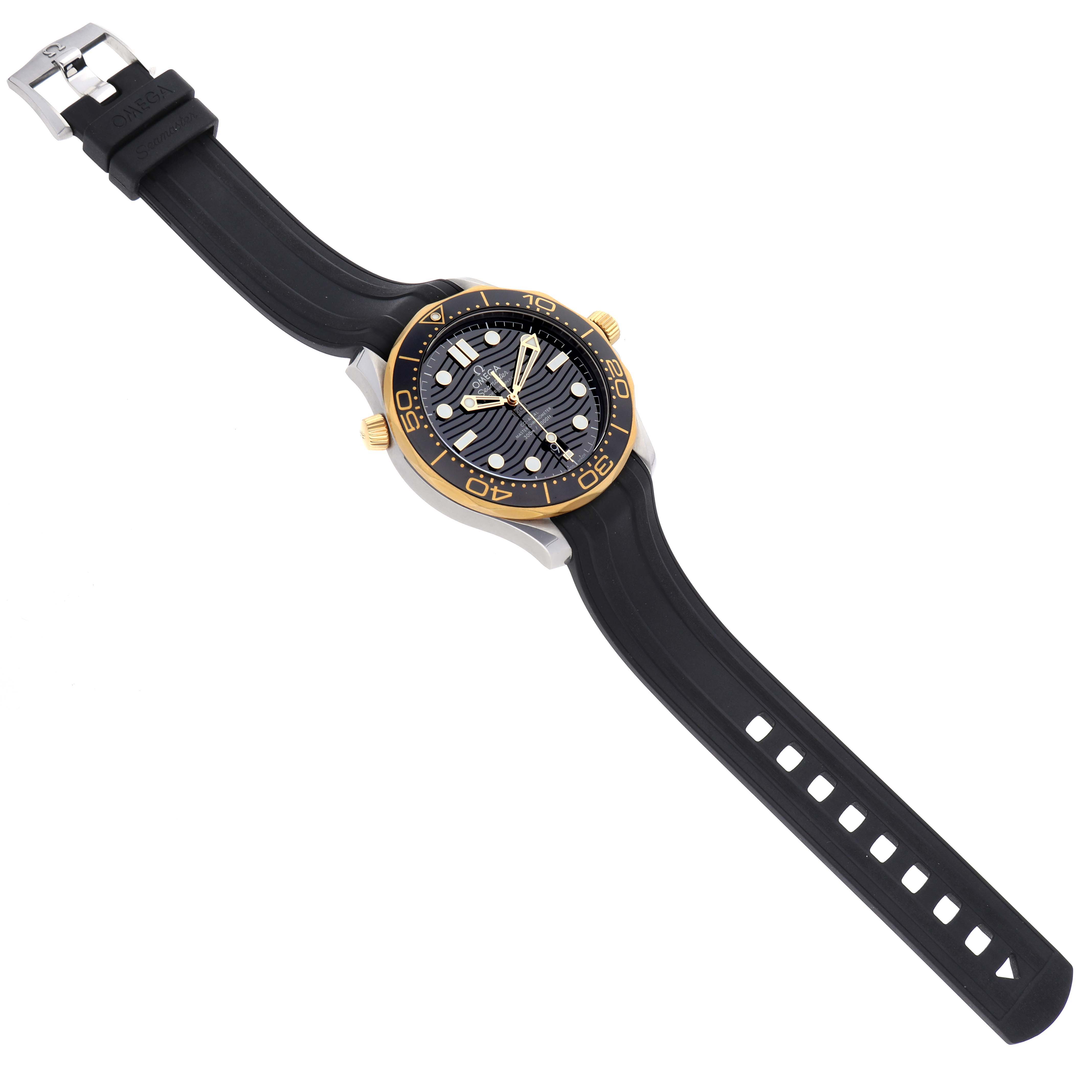 The Omega Seamaster 210.22.42.20.01.001 Men
s Steel and Gold (two tone) Black Dial 210.22.42.20.01.001 Men
s Steel and Gold (two tone) Black Dial is angled slightly from above, showing the face, bezel, crown, lugs, and black strap.