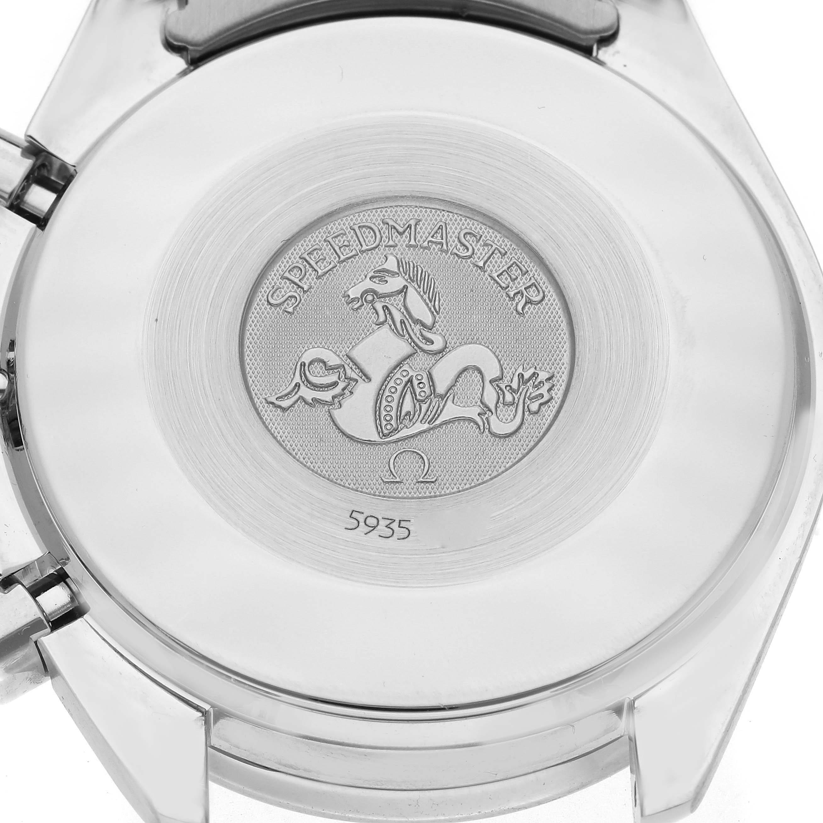 The image shows the back case of an Omega Speedmaster 3502.78.00 Men
s Stainless Steel Mother of Pearl Dial 3502.78.00 Men
s Stainless Steel Mother of Pearl Dial watch, featuring an engraved emblem and serial number.