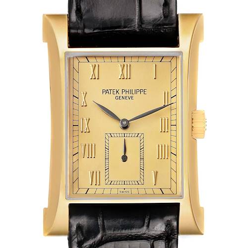 The Patek Philippe Pagoda 5500J Men's Yellow Gold Champagne Dial watch is shown from a front view, displaying its rectangular dial, gold case, and black leather strap.
