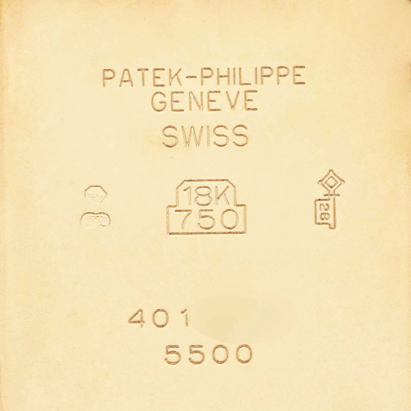 This image shows the interior case back of a Patek Philippe Pagoda 5500J Men's Yellow Gold Champagne Dial watch, highlighting engravings and hallmarks.