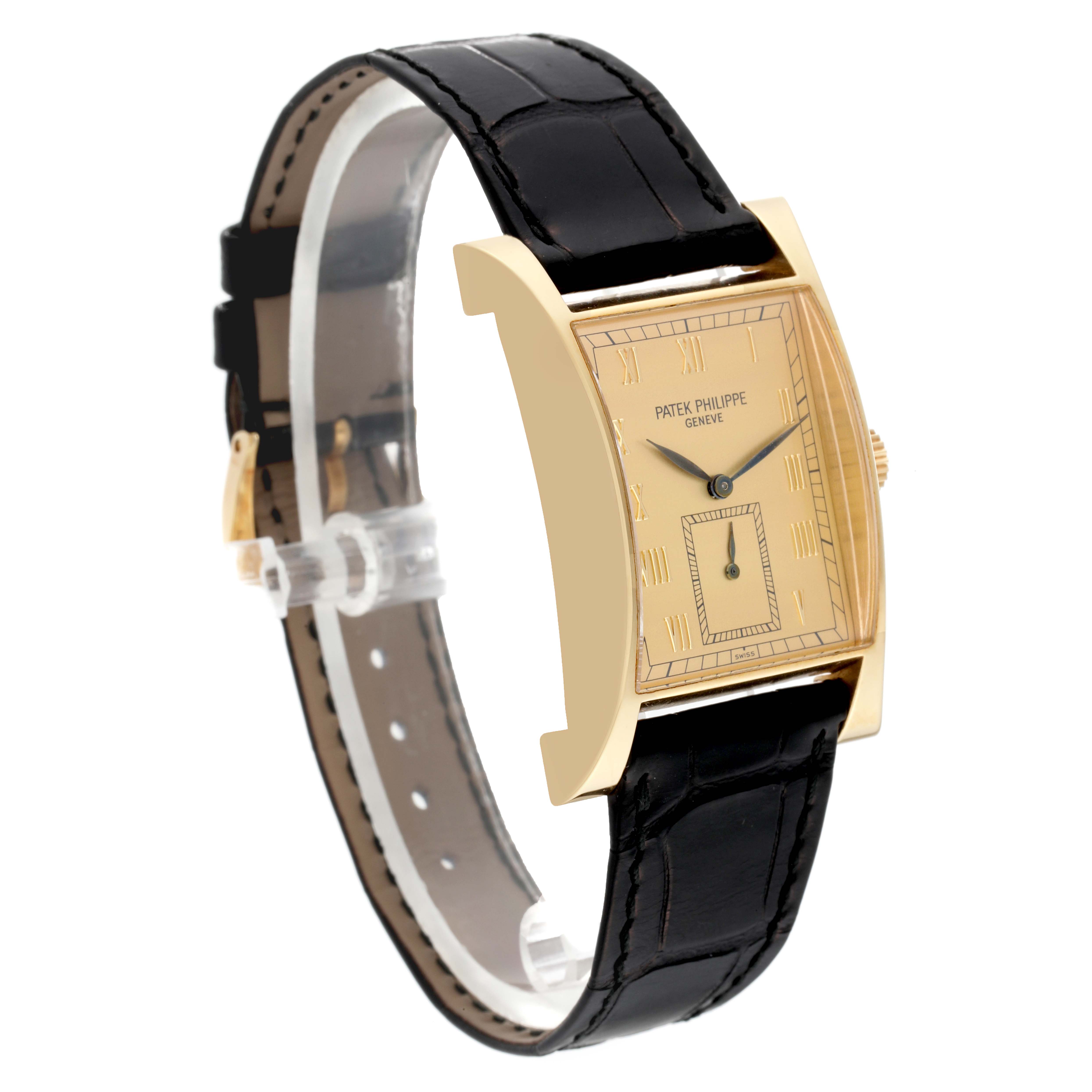 The image shows a side-angle view of the Pagoda model by Patek Philippe, highlighting its rectangular case and black leather strap.