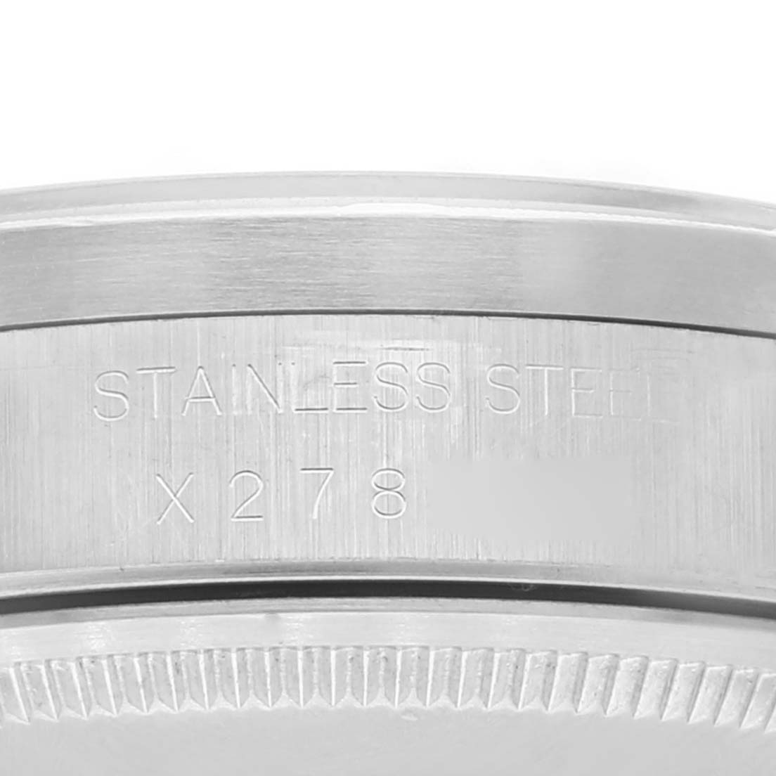 The image shows a close-up of the stainless steel side and caseback edge of a Rolex Air-King 14010 Men's Stainless Steel Blue Dial 14010 Men's Stainless Steel Blue Dial watch.