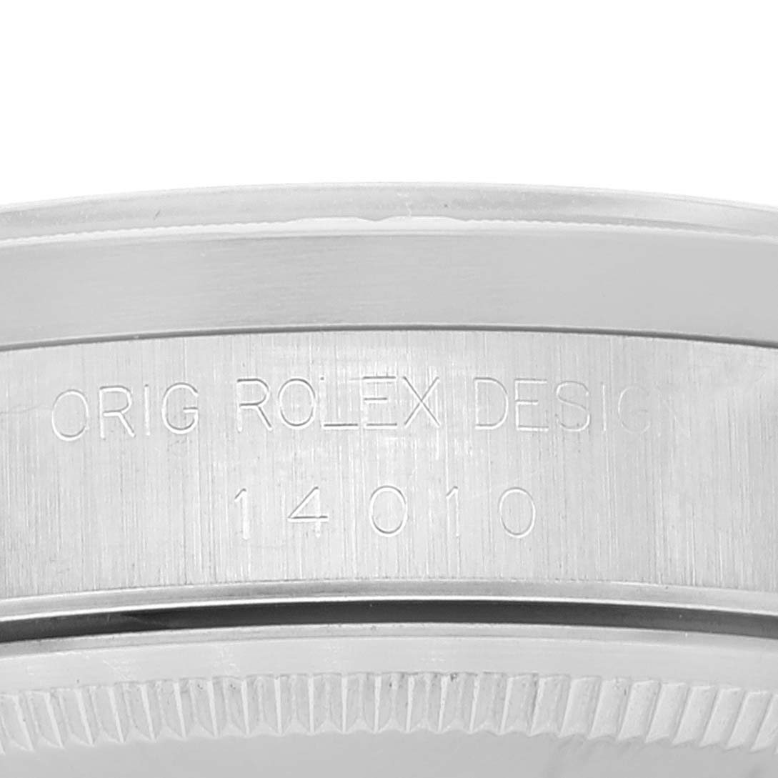 This image shows an angled view of the side casing and bezel edge of a Rolex Air-King 14010 Men's Stainless Steel Blue Dial 14010 Men's Stainless Steel Blue Dial watch, highlighting the engraved model details.