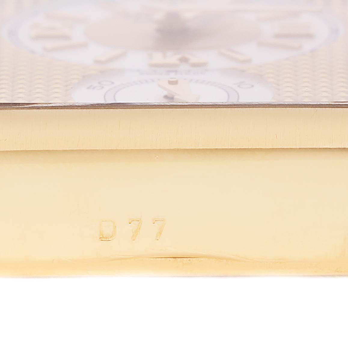 The image shows a close-up of the side view of a Rolex Cellini 5440 Men
s Yellow Gold Champagne Dial 5440 Men
s Yellow Gold Champagne Dial watch, highlighting its case and part of the dial.