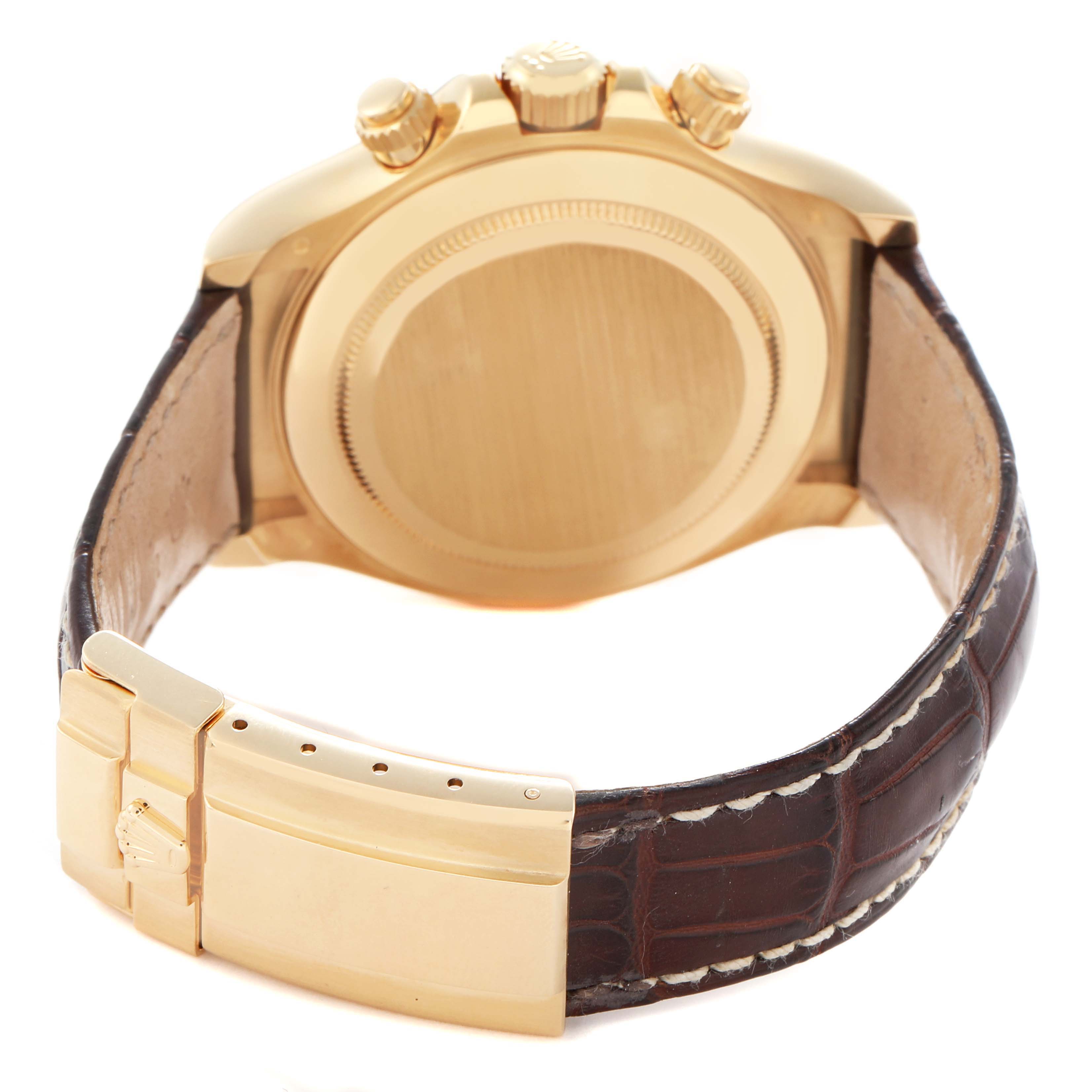 The image shows the back of a Rolex Daytona 116518 Men
s Yellow Gold Blue Dial 116518 Men
s Yellow Gold Blue Dial watch, highlighting the case back, crown, pushers, and leather strap with a gold clasp.