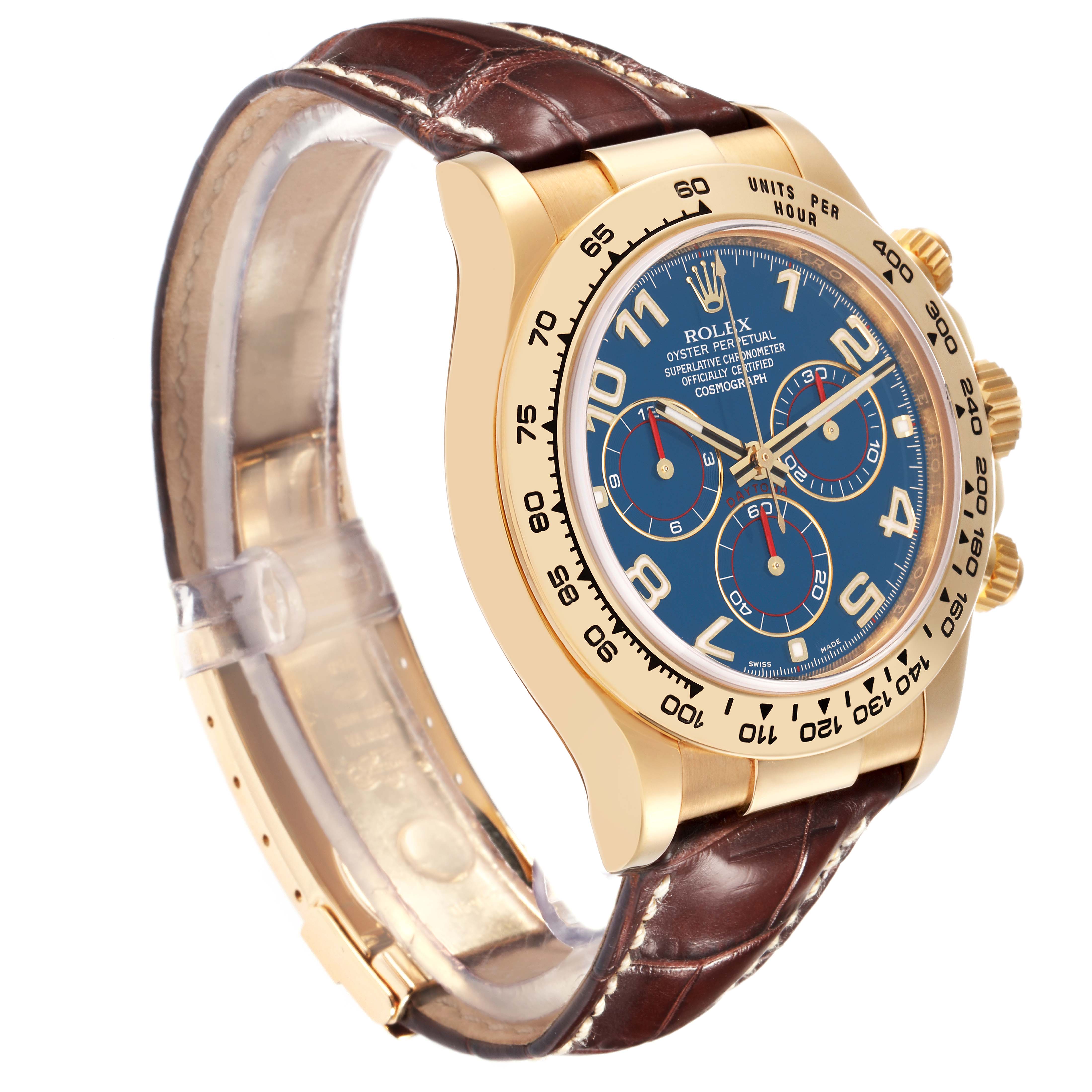 The Rolex Daytona 116518 Men
s Yellow Gold Blue Dial 116518 Men
s Yellow Gold Blue Dial watch is shown at a three-quarter angle, highlighting its blue dial, gold case, and brown leather strap.