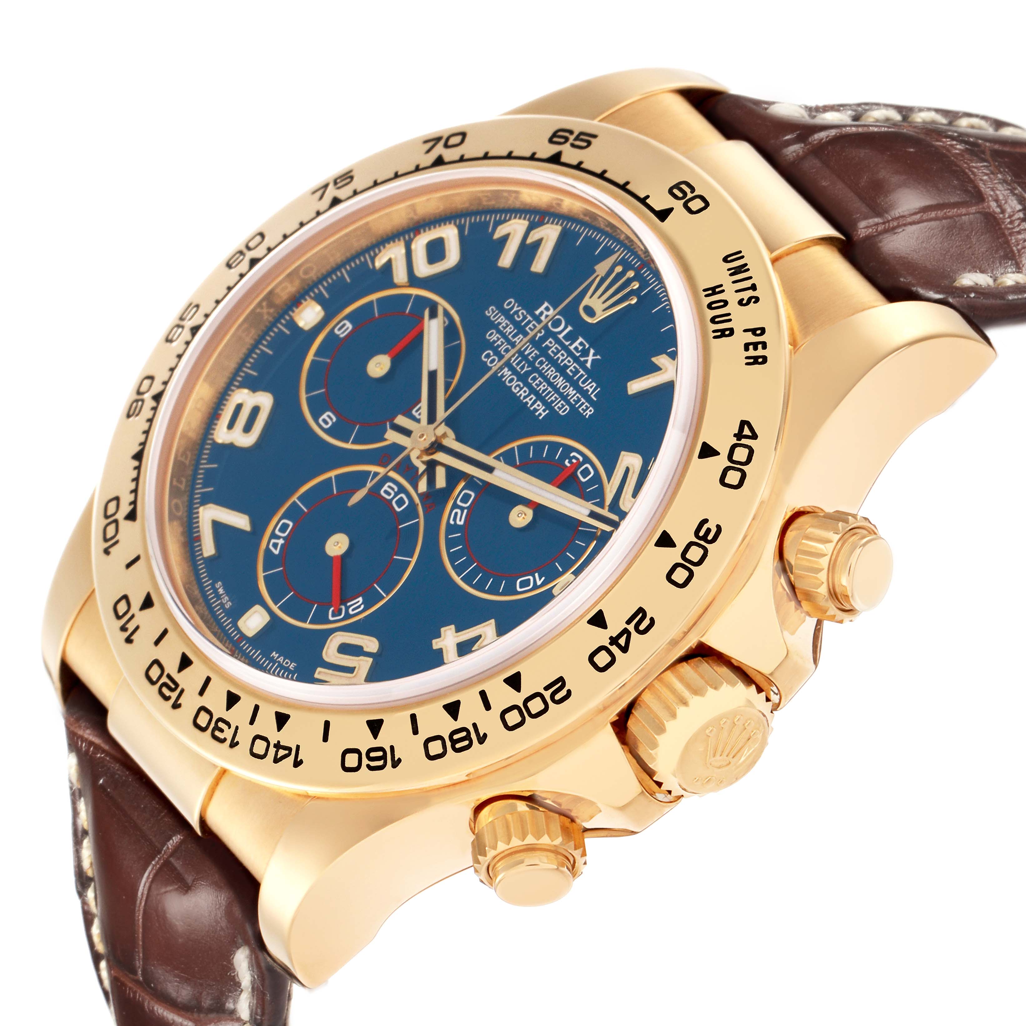 The image shows a Rolex Daytona 116518 Men
s Yellow Gold Blue Dial 116518 Men
s Yellow Gold Blue Dial watch at an angled side view, highlighting the bezel, crown, pushers, and part of the leather strap.