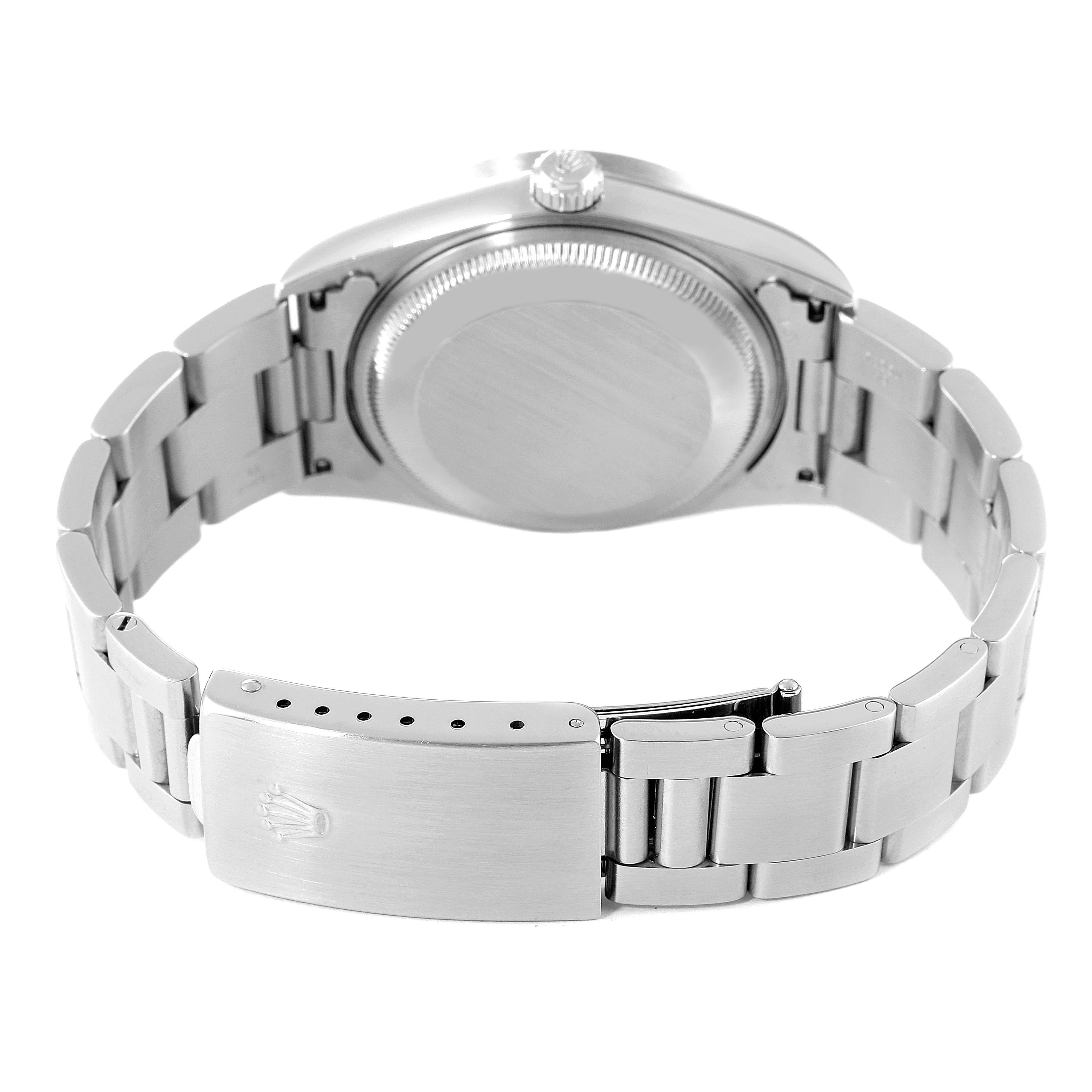 The image shows the back case, bracelet, and clasp of a Rolex Date 15210 Men's Stainless Steel Pink Dial 15210 Men's Stainless Steel Pink Dial model.