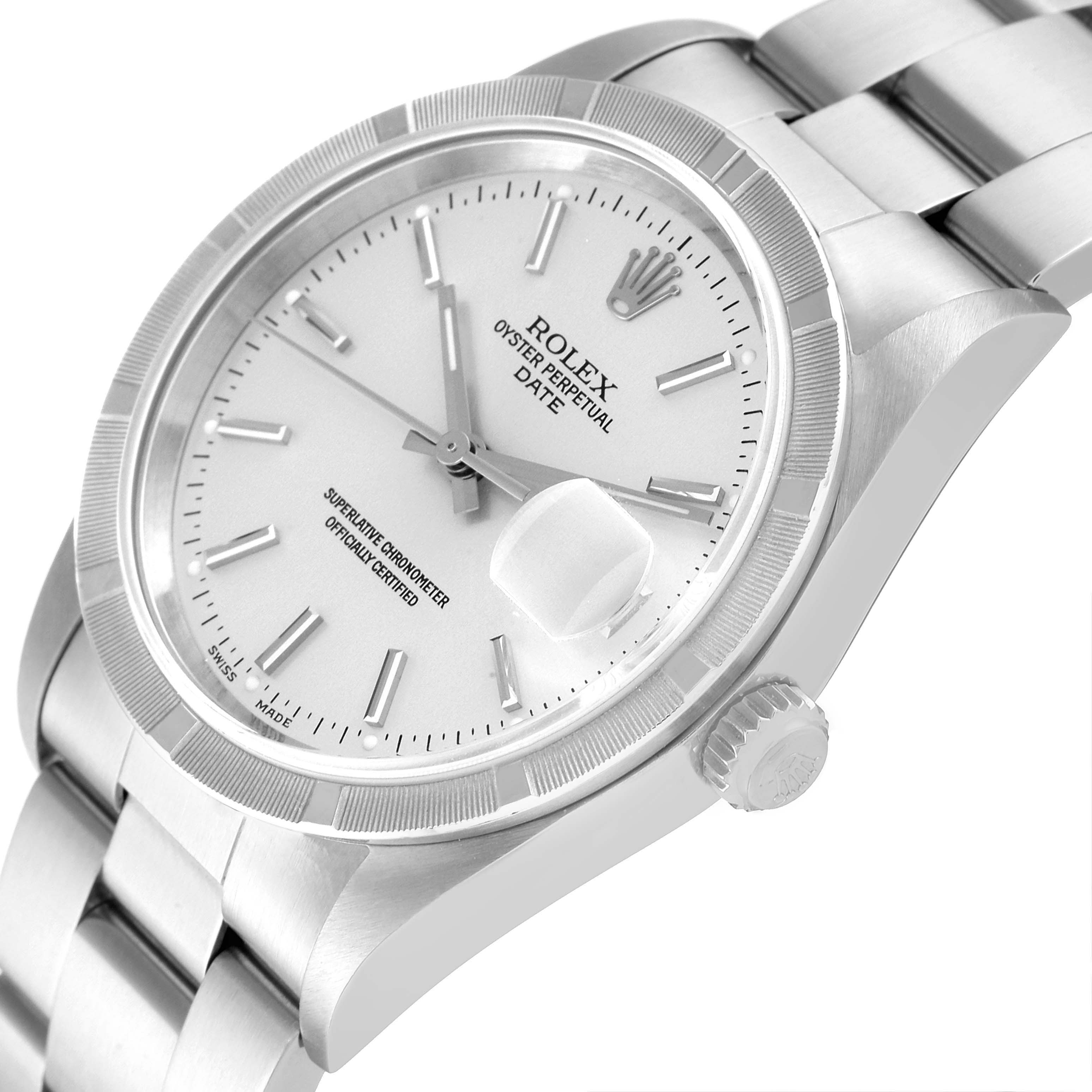 The image shows a close-up view of the Rolex Oyster Perpetual Date's face, crown, and part of the bracelet.