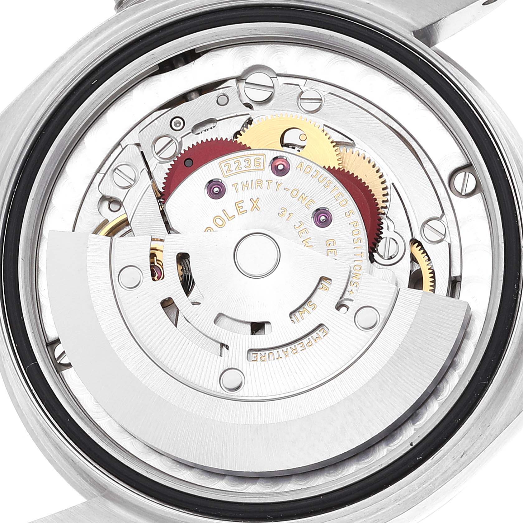 The image shows the internal mechanism and components of a Rolex Mid-Size 278240 Women
s Stainless Steel Blue Dial 278240 Women
s Stainless Steel Blue Dial model watch from a rear angle.