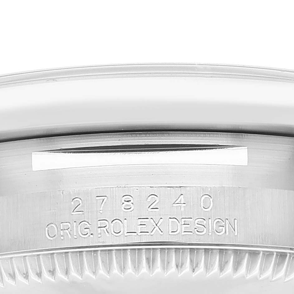This image shows a close-up of the side of a Mid-Size Rolex watch, highlighting the model number and "ORIG. ROLEX DESIGN" engraving.