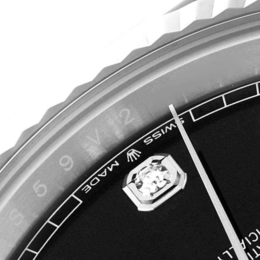 This close-up image shows the dial, bezel, and part of the indices of the Rolex Datejust 41 126334 Men's Stainless Steel Black Dial 126334 Men's Stainless Steel Black Dial watch.