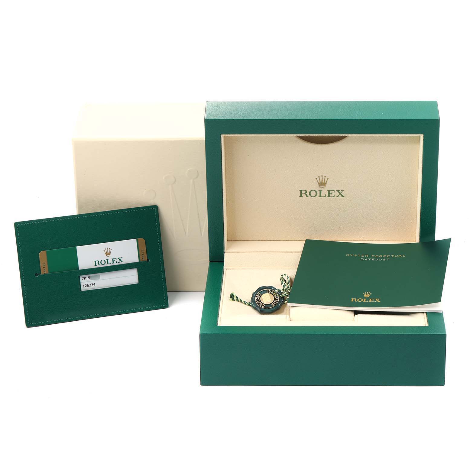 The image shows the packaging, warranty card, and booklets for a Rolex Datejust 41 126334 Men
s Stainless Steel White Dial 126334 Men
s Stainless Steel White Dial watch.