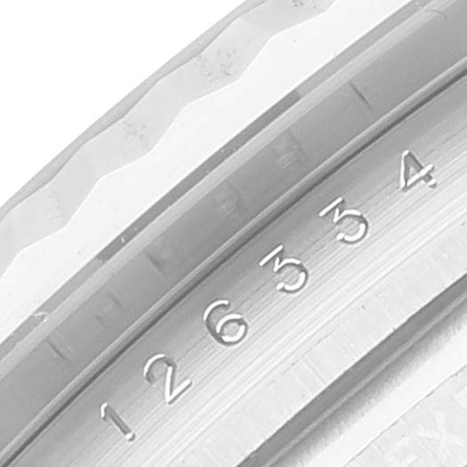 This image shows a close-up of the rehaut and fluted bezel of a Rolex Datejust 41 126334 Men
s Stainless Steel Grey Dial 126334 Men
s Stainless Steel Grey Dial model.