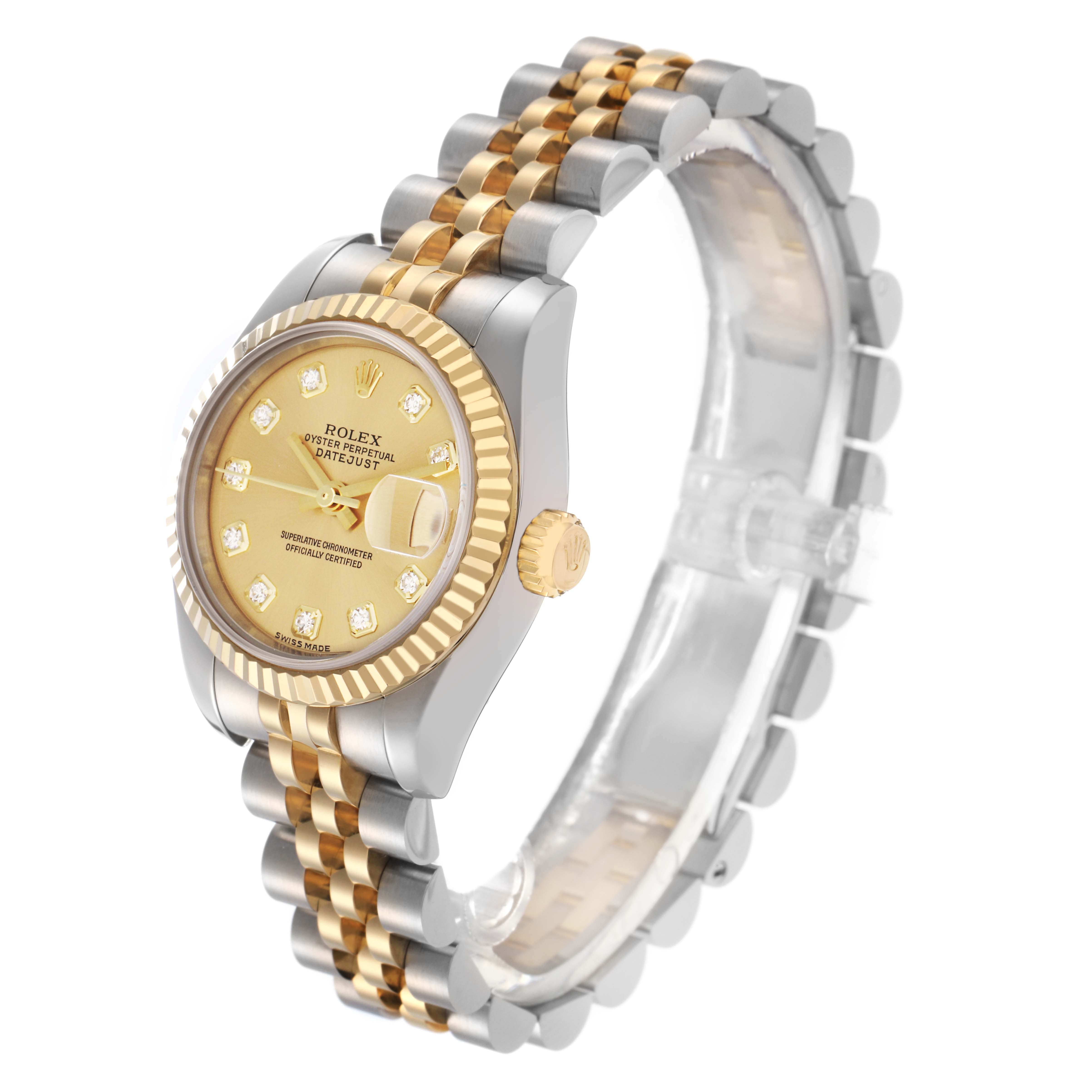 The Rolex Datejust 179173 Women
s Steel and Gold (two tone) Champagne Dial 179173 Women
s Steel and Gold (two tone) Champagne Dial watch is shown at an angled side view, highlighting the gold bezel, dial, crown, and two-tone bracelet.