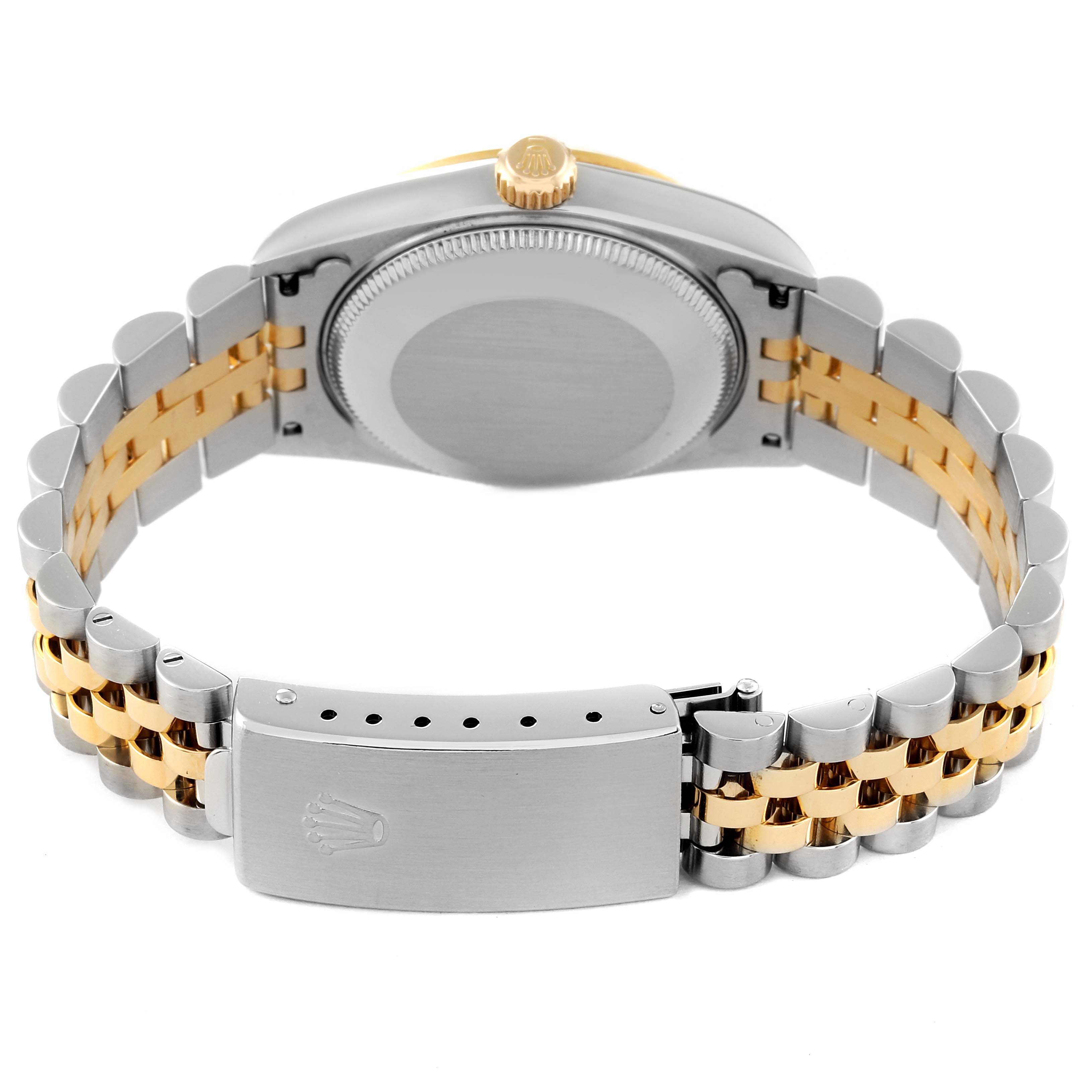 The image shows the back view of a Rolex Mid-Size 78273 Women's Steel and Gold (two tone) Mother of Pearl Dial 78273 Women's Steel and Gold (two tone) Mother of Pearl Dial model watch, focusing on its closed clasp and bi-metal bracelet.