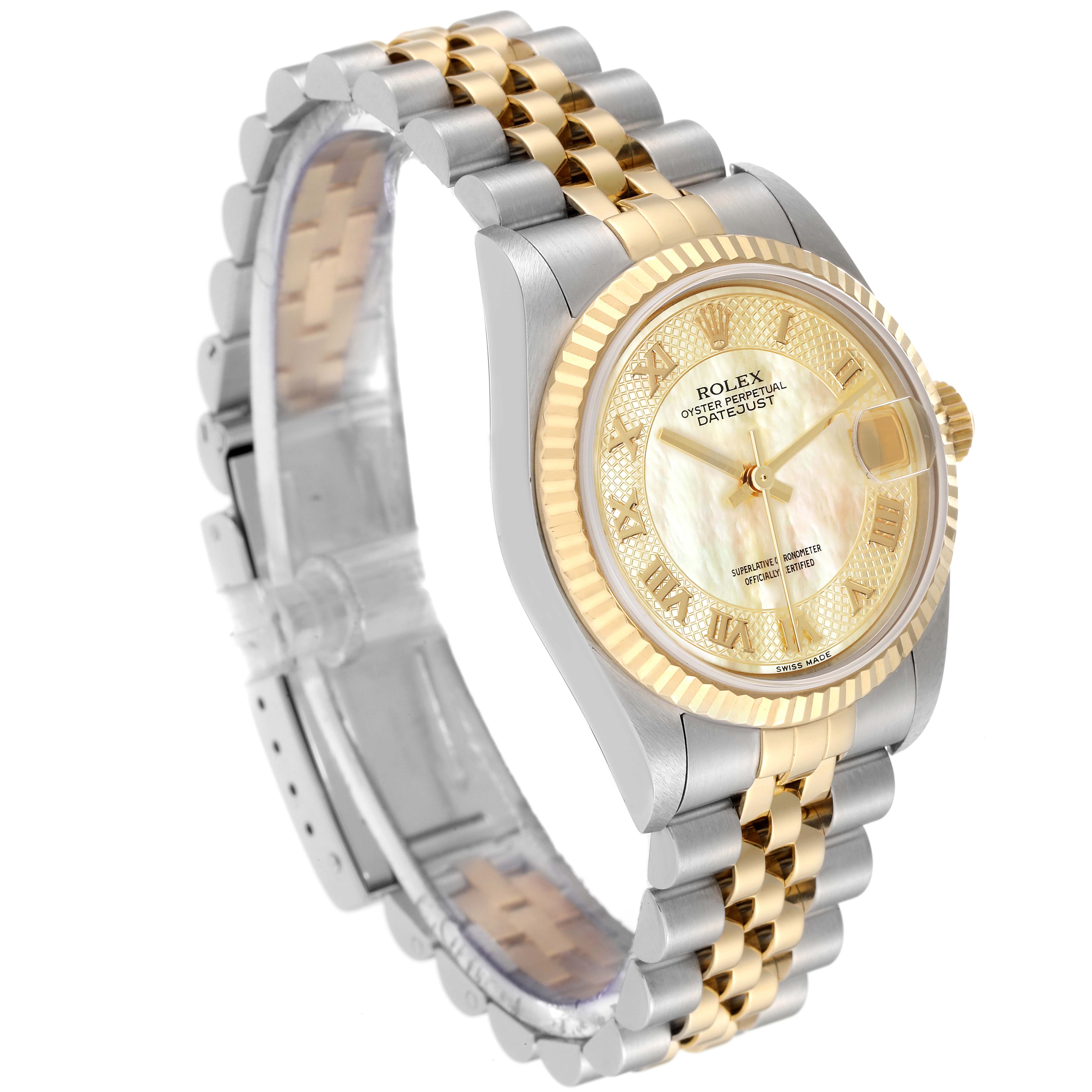 This Rolex Mid-Size 78273 Women's Steel and Gold (two tone) Mother of Pearl Dial 78273 Women's Steel and Gold (two tone) Mother of Pearl Dial Datejust watch is shown from a three-quarter angle, highlighting its face, bezel, and two-tone bracelet.